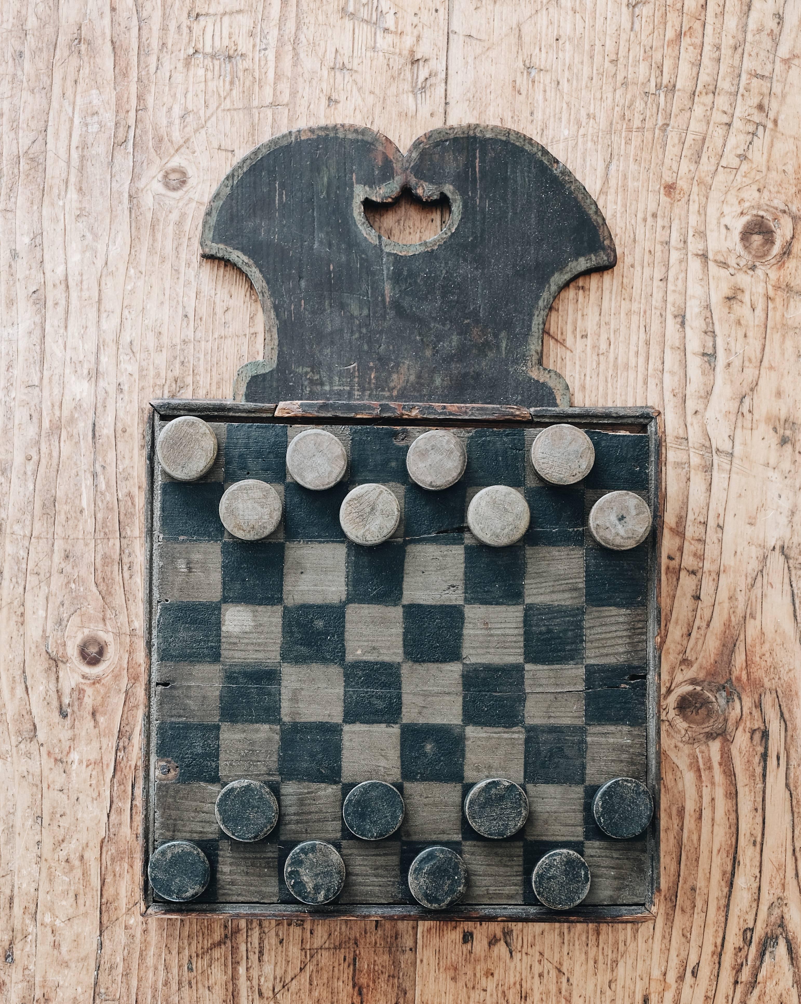An unusual Swedish 19th century Folk Art checkers game in original condition, circa 1800, Sweden.