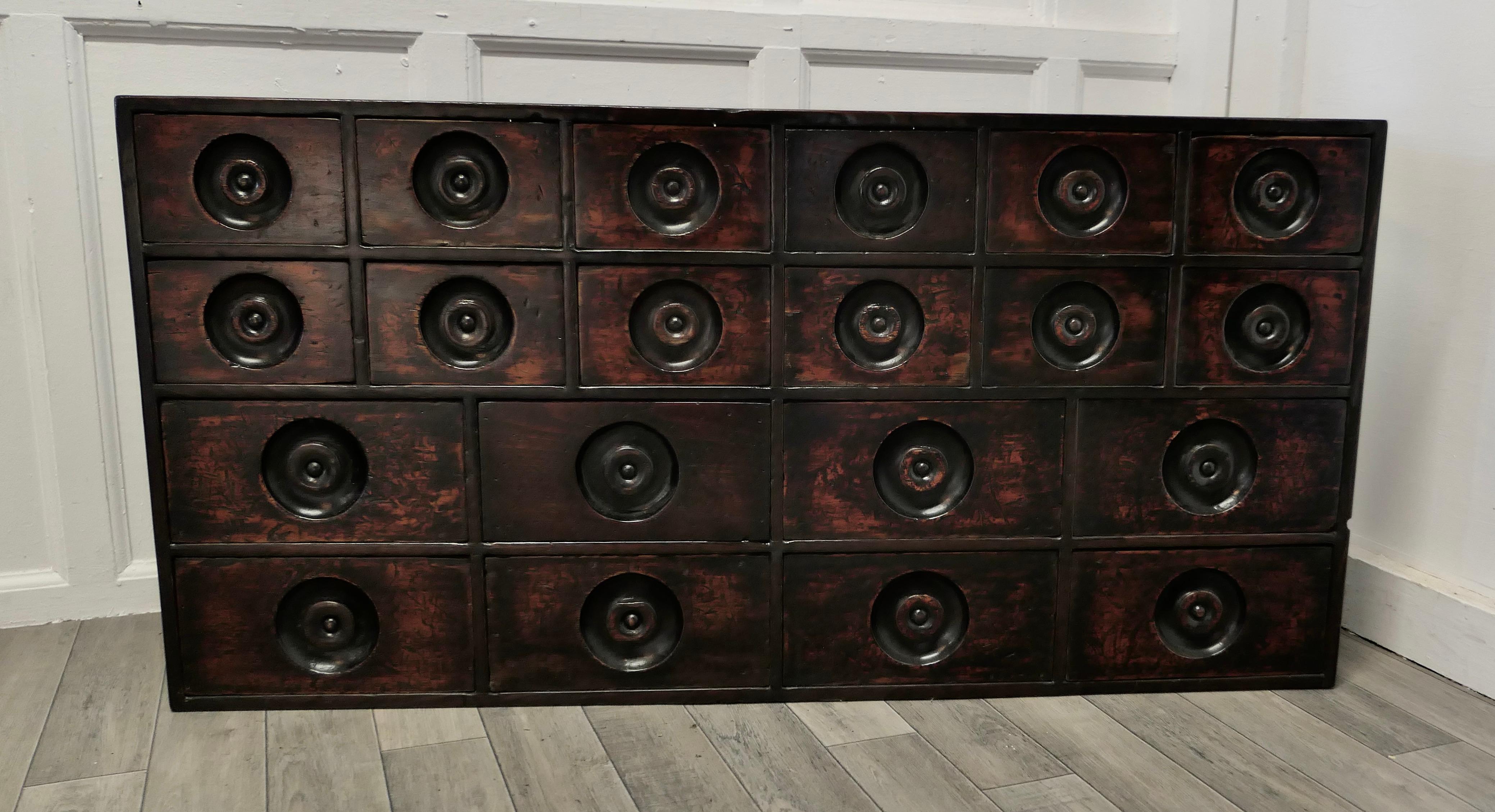 19th century Chemist drawers 20 drawer Pharmacists cabinet

This is a delightful piece of Social History, it has been made in to a free standing Chest of Drawers, originally it would have been part of a much larger bank of drawers from a Chemist