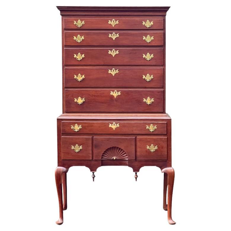 What furniture style is the Queen Anne highboy?