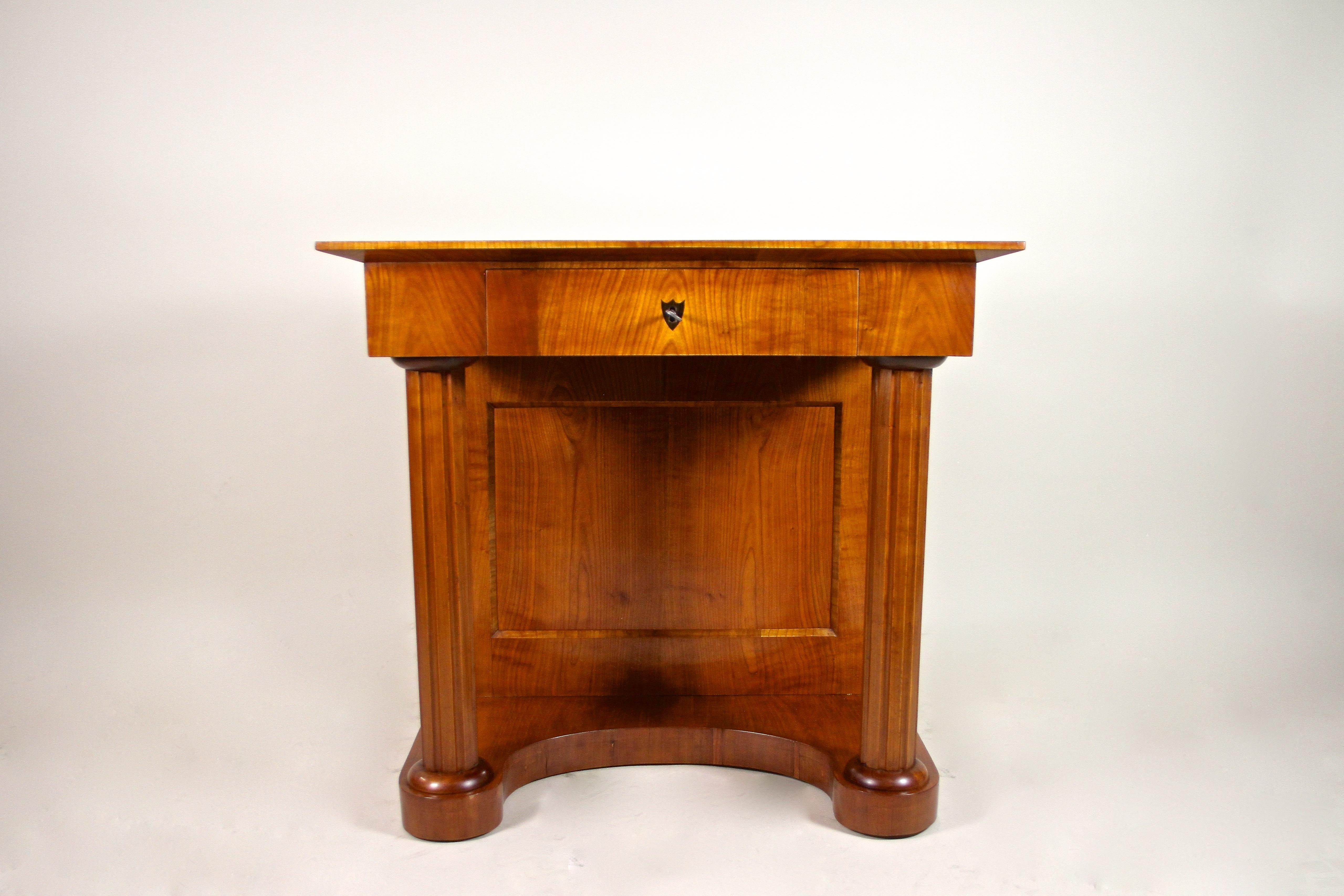 Very appealing mid 19th century cherrywood Console Table from the second Biedermeier period around 1860 in Austria. Veneered in fine cherrywood this perfect restored Biedermeier console impresses with graceful curves and exceptional lines. Wonderful