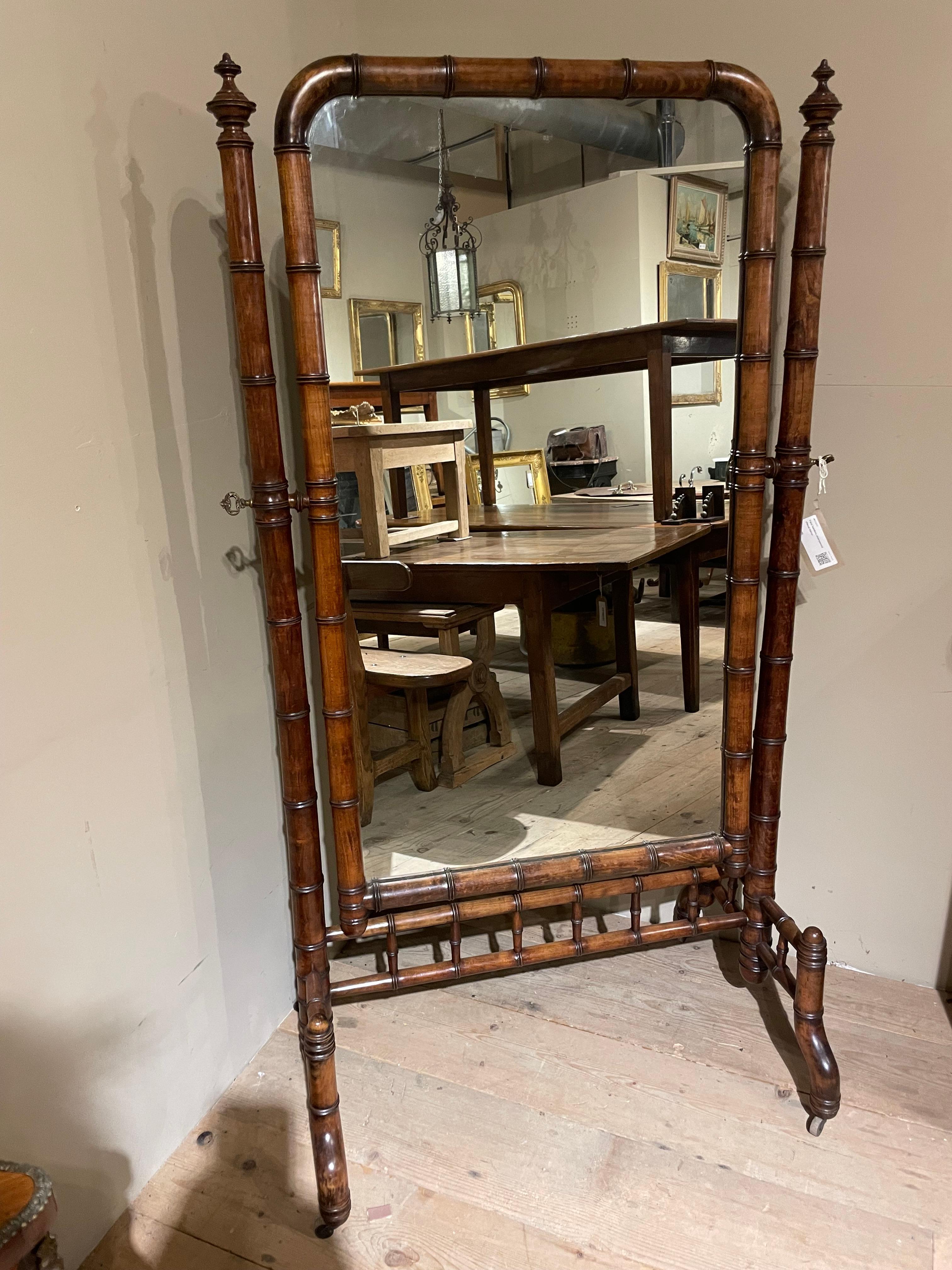 Great late 19th Century French cherrywood, faux bamboo cheval mirror.

Cleaned, waxed and polished to bring out the warmth of the cherrywood.

Circa 1870s.
