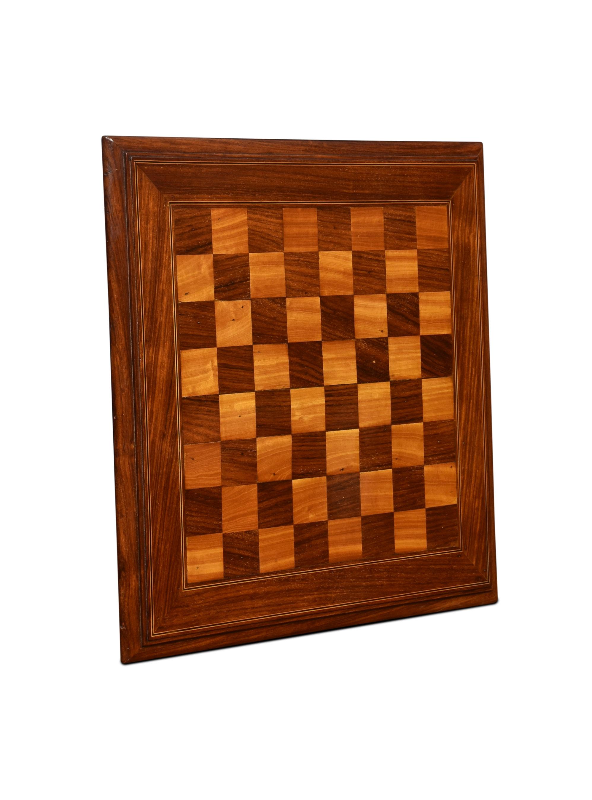 19th-century chess board, of typical square form with alternating piece squares.
Dimensions
Height 1 inches
Width 20.5 inches
Depth 20.5 inches.
