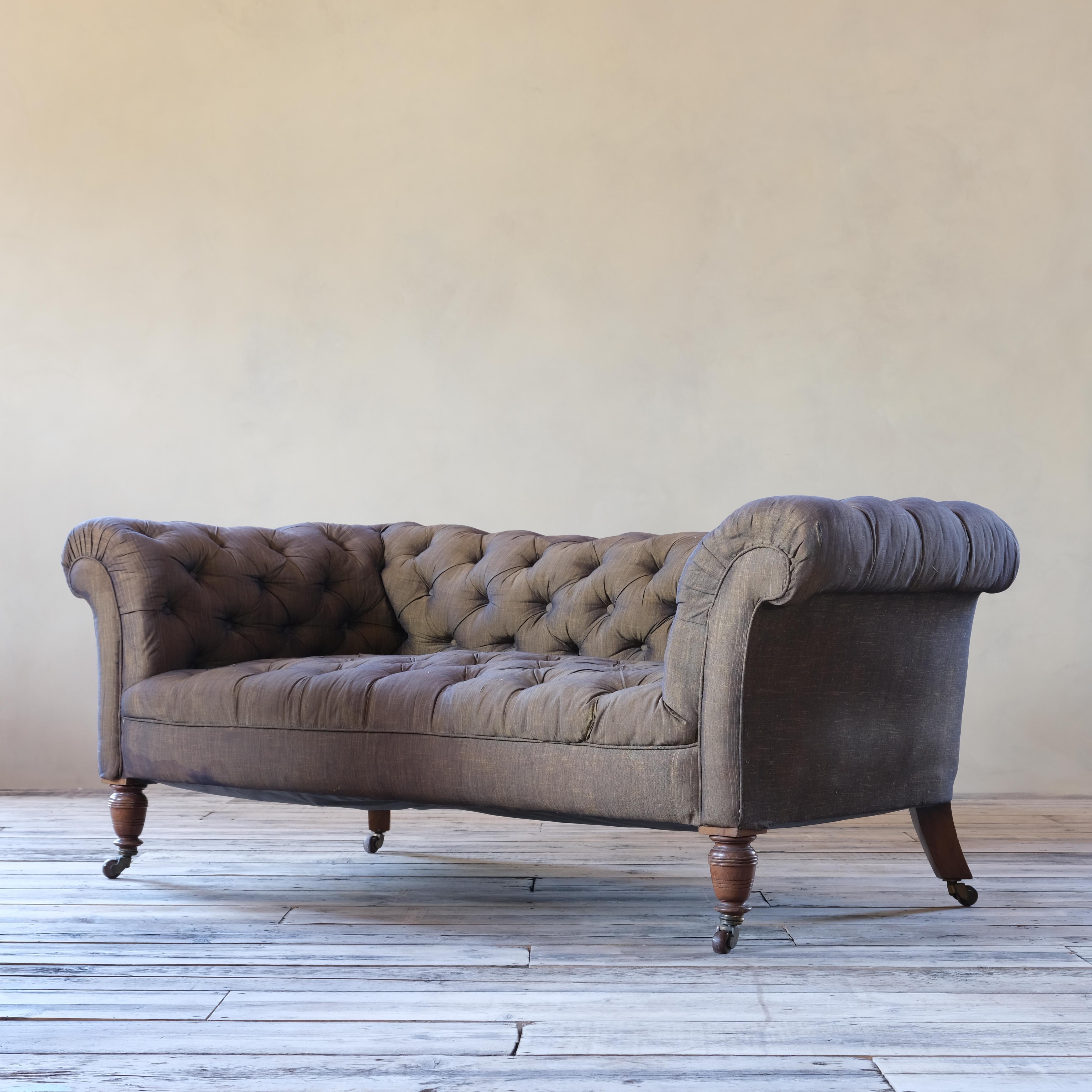 A good quality 19th century compact chesterfield sofa by Hampton & sons of Pall Mall - London. Raised on Walnut legs and the original stamped brass and ceramic casters. 

In good solid order and just requiring upholstery. 

For upholstery

As