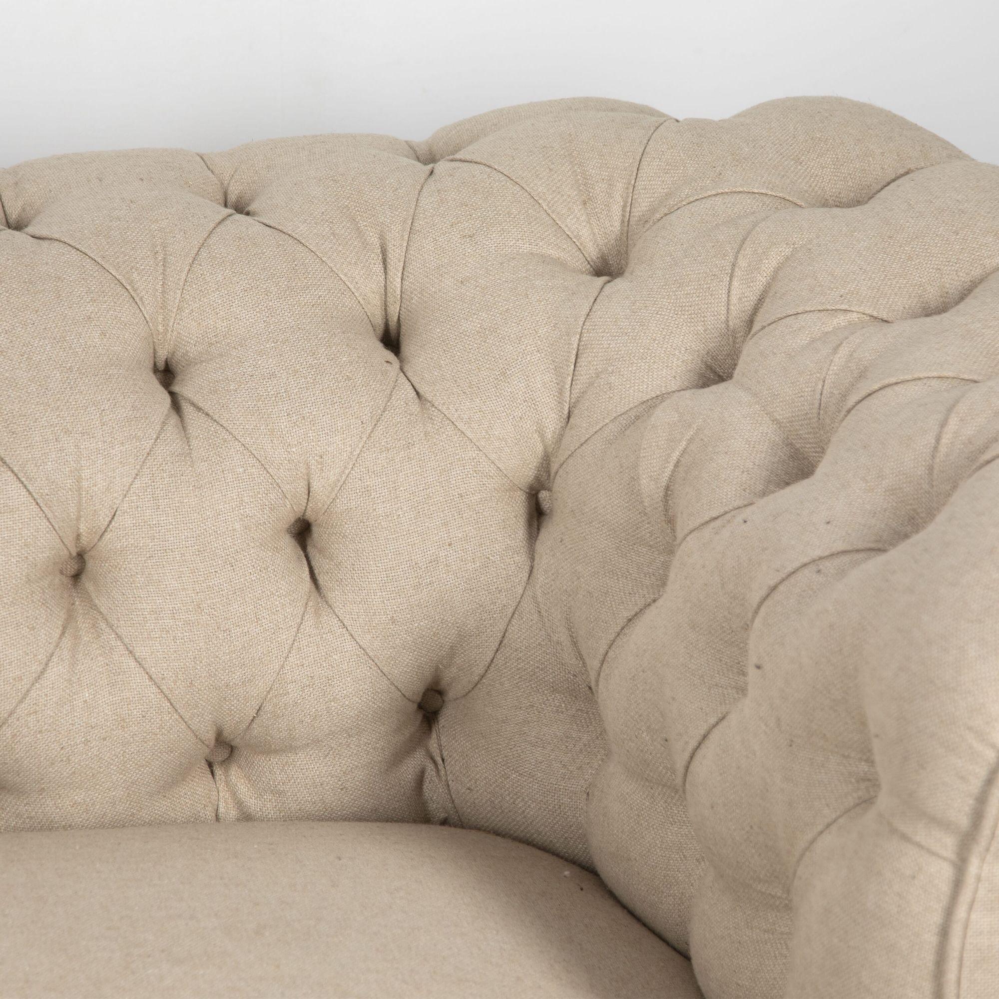 Fabulous 19th century English style Chesterfield sofa.
With a button back and convex seat on turned legs and castors. This sofa has been fully reupholstered. 
circa 1890.