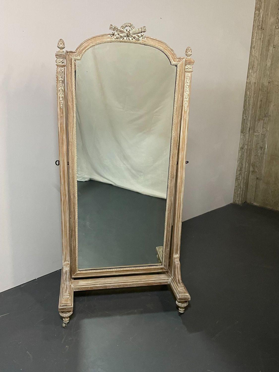 19th Century Cheval, Floor Mirror, Louis XVI, Whitewashed, Standing Mirror
An Antique Cheval or Floor Mirror in the Louis XVI Style. This recently white washed frame finely carved with cartouche with floral ornament as well as bow and arrow