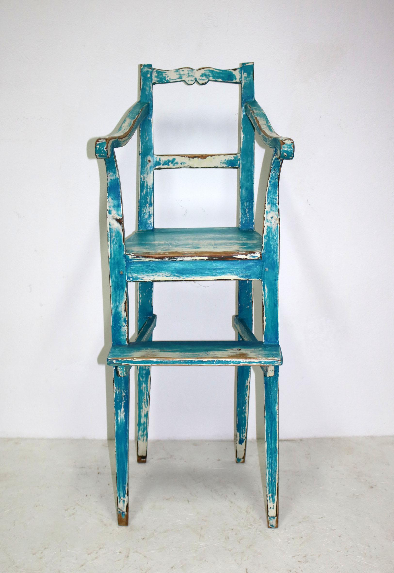 This is a beautiful ocena blue and white children's dining chair. It was used in a noble family in order to increase the seating height of their child.