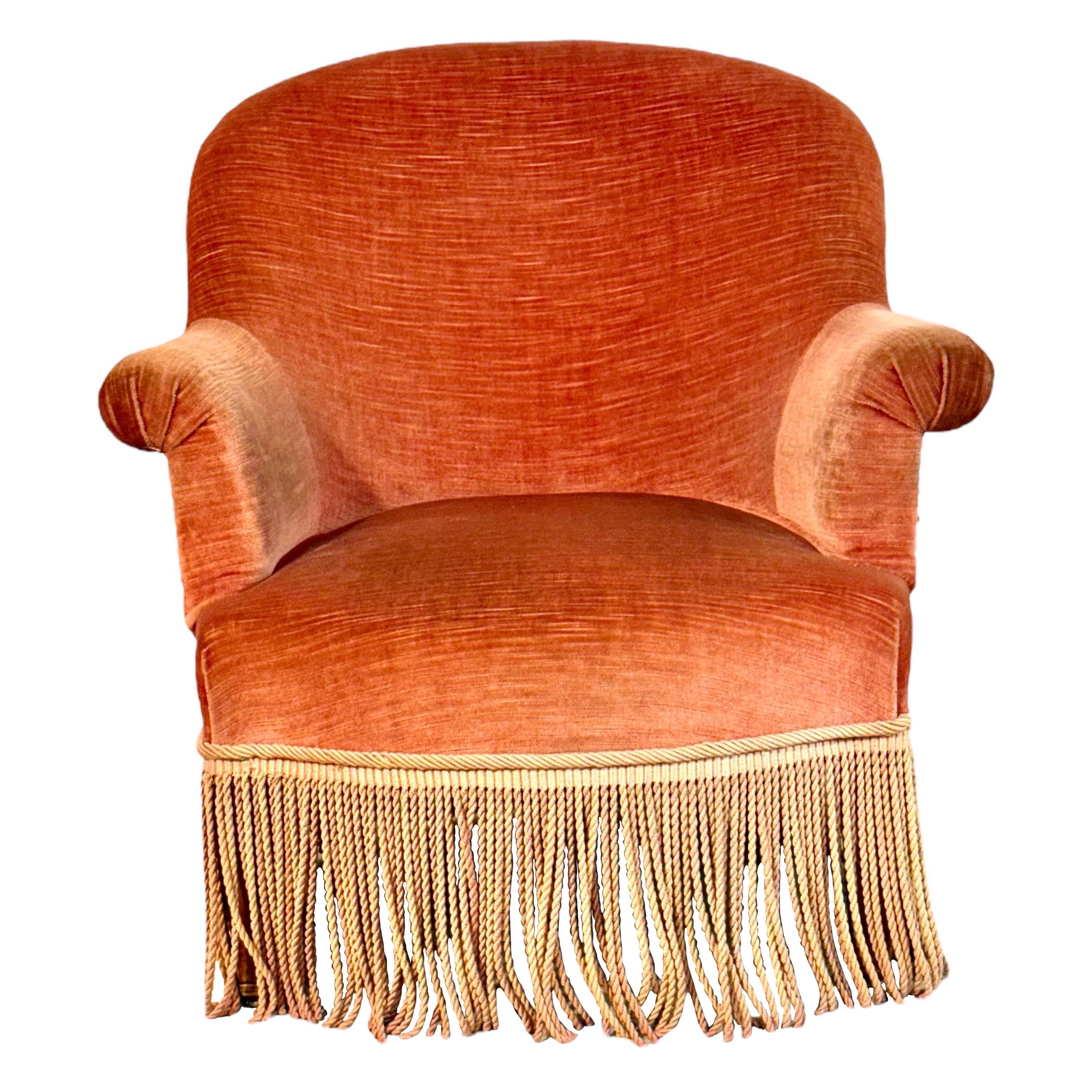 Sillón infantil de terciopelo del siglo XIX con flecos decorativos