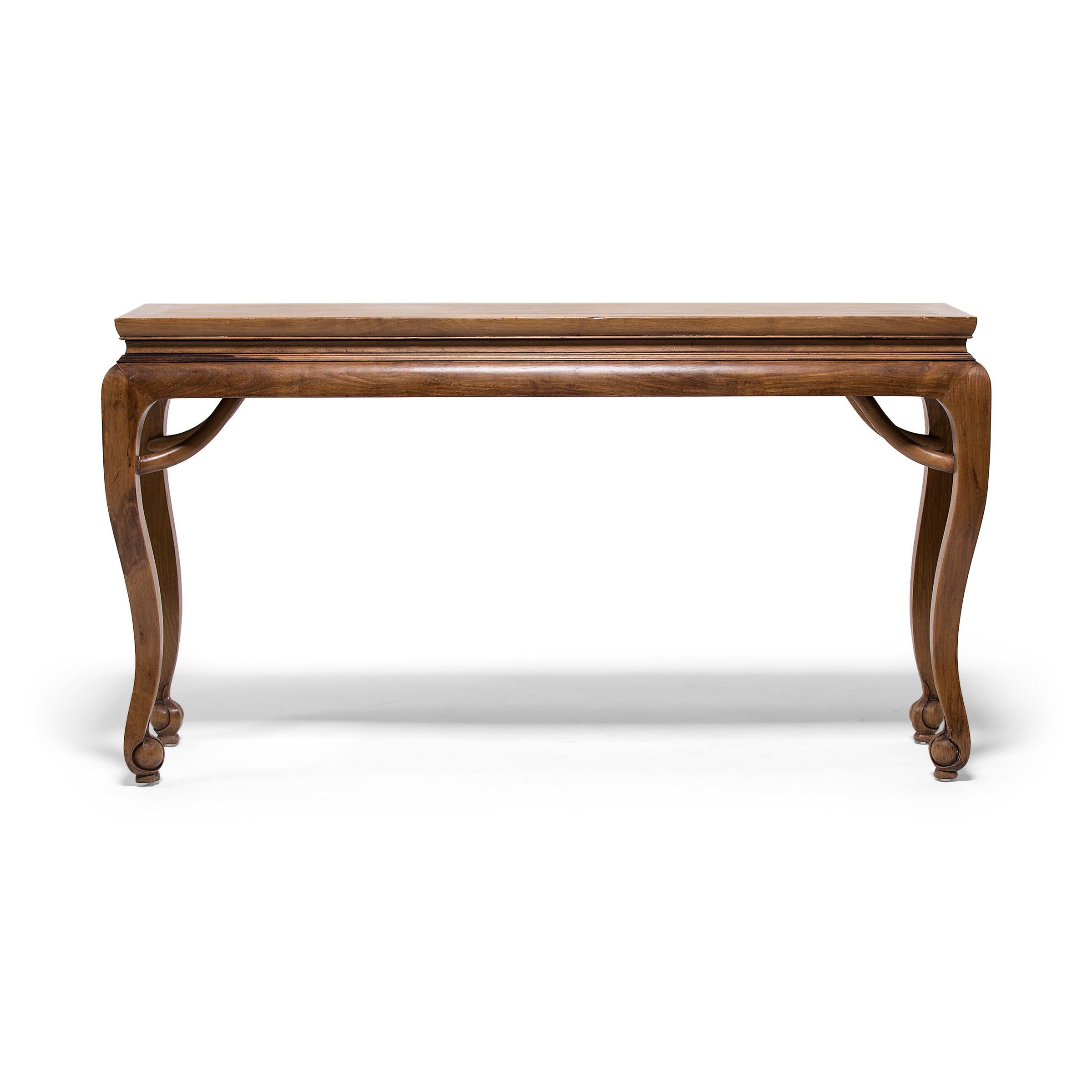 With deceptively simple design, this narrow table would have been favoured by a well-to-do family for its fine material and well-executed curves, arched like the sweep of a calligraphy brushstroke. Constructed of fine linden wood with