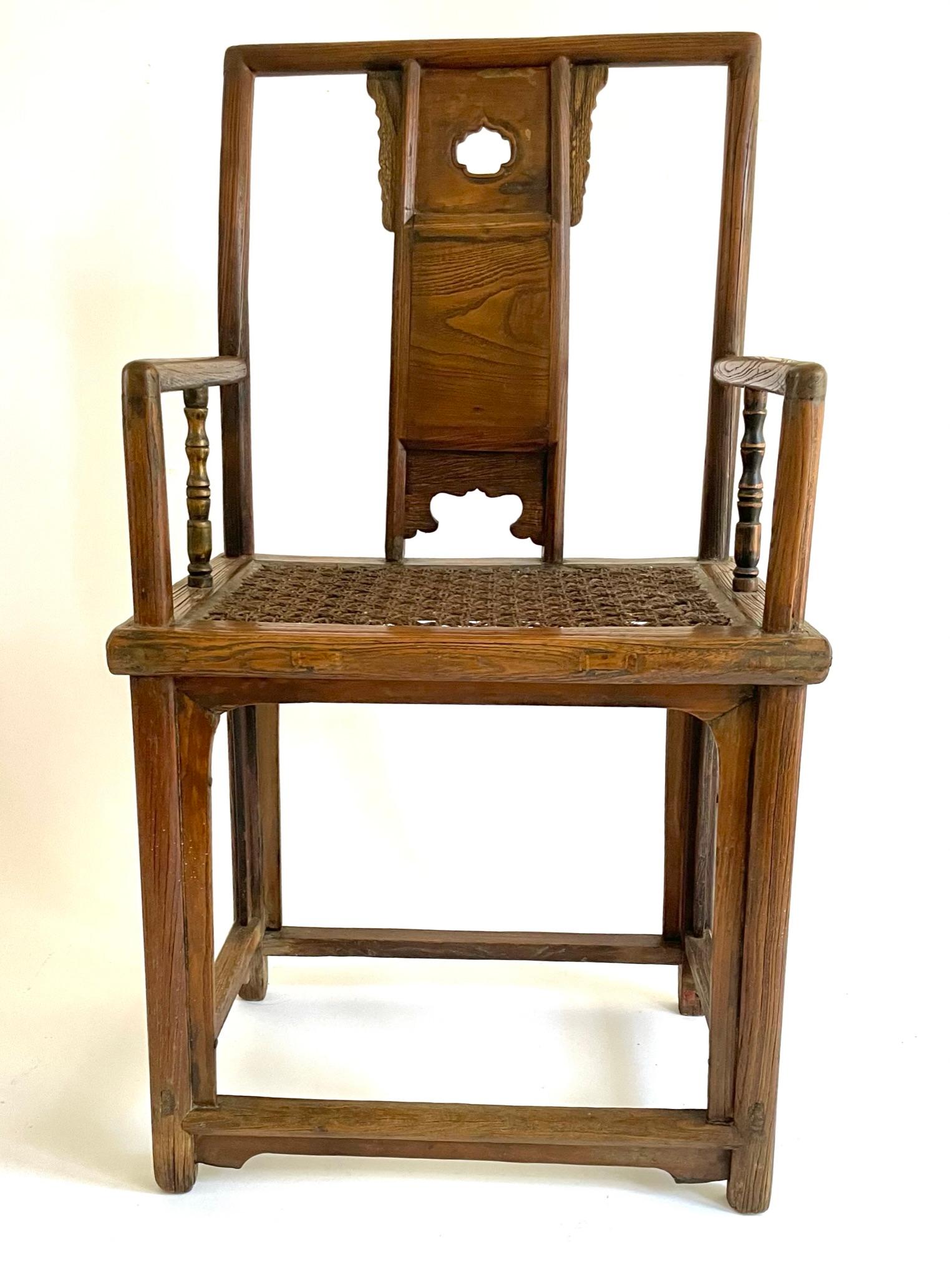 This Nicely proportioned Qing Dyanty, Chinese armchair with simple Ming lines is handcrafted with Northern Elm (Yumu) using traditional mortise and tenon joinery. The seat has been rewoven with burlap yarn, sometime within its lifetime. The arm has