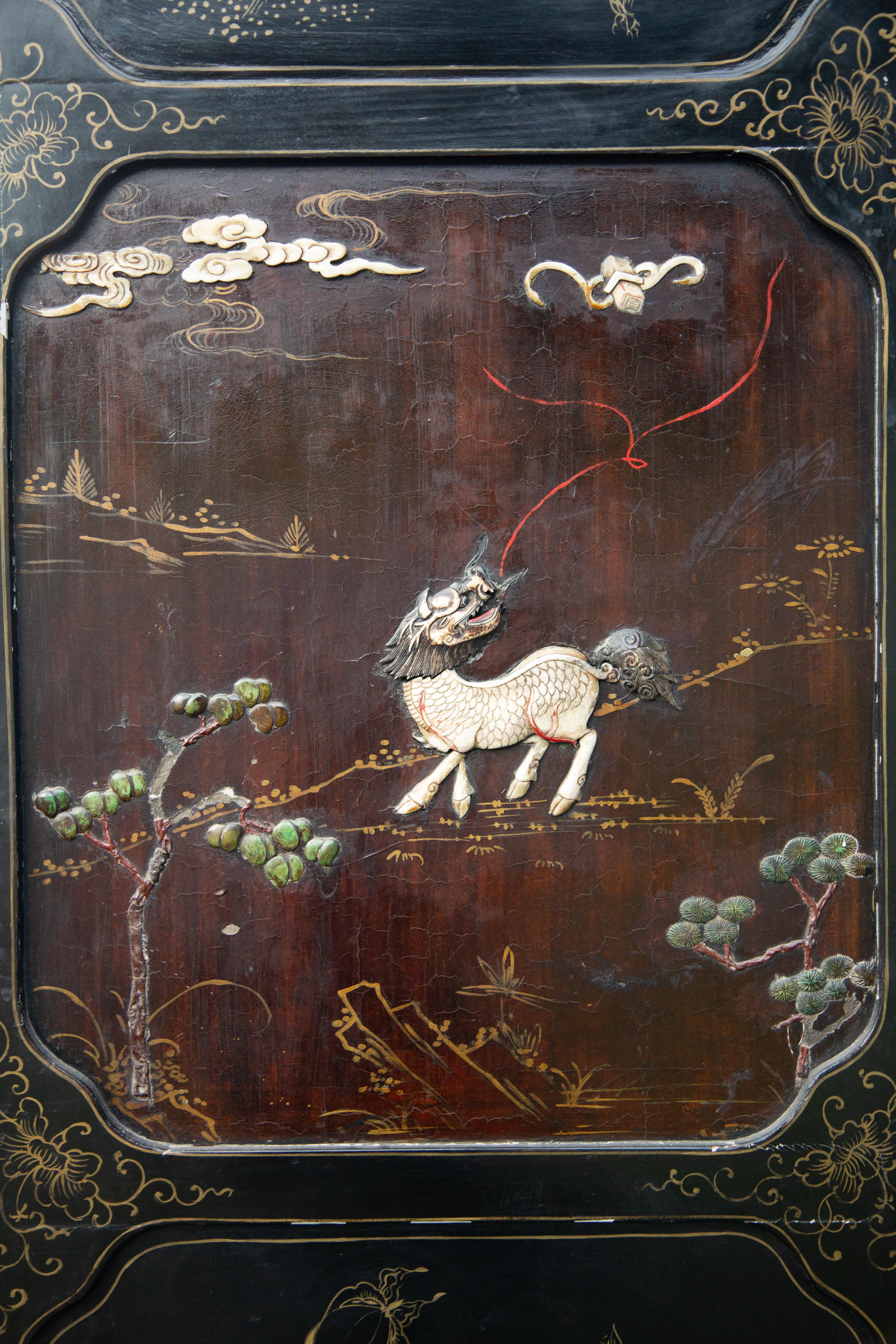 19th Century Chinese Armoire Decorated with High Relief Flora and Fauna 57.75