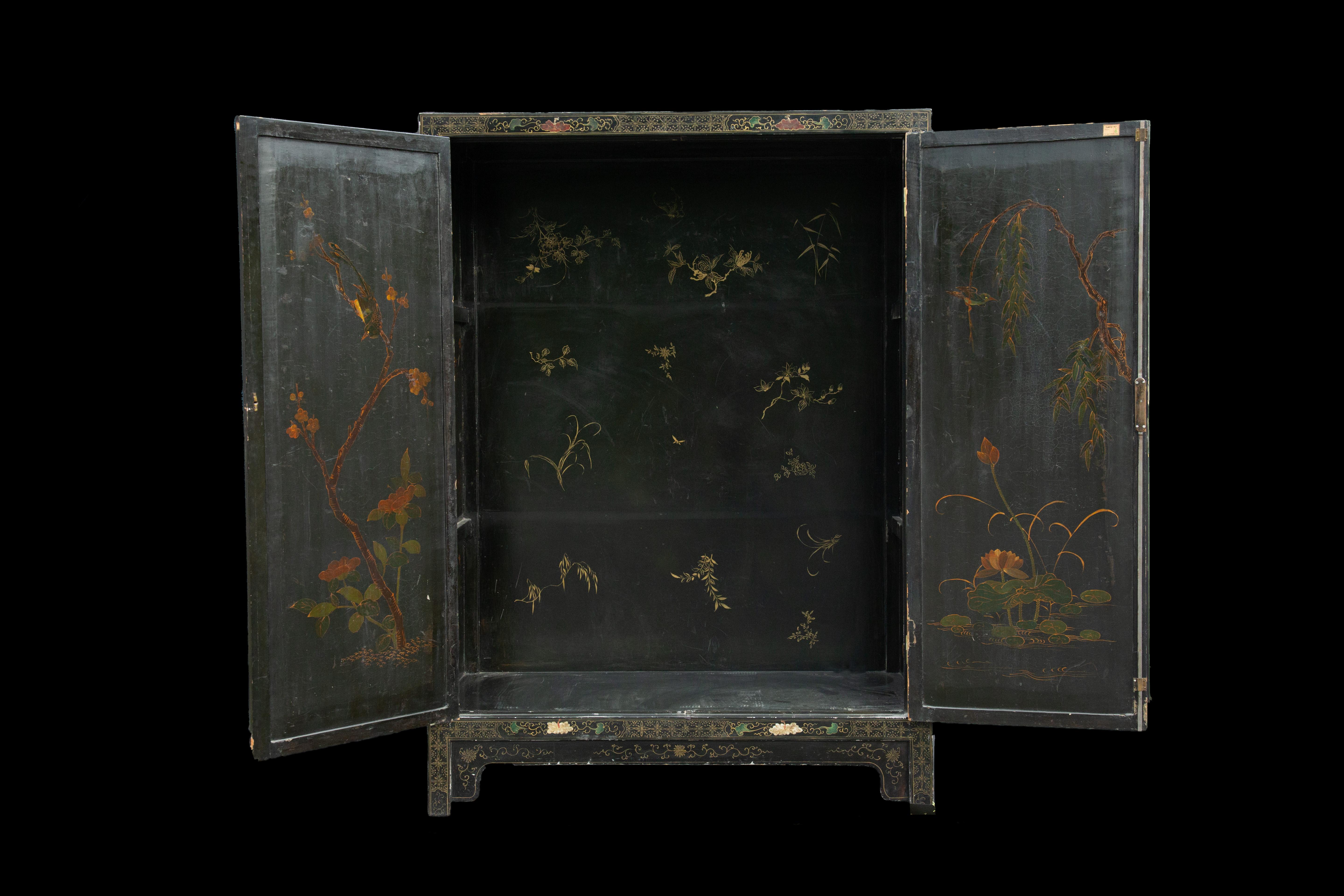 Inlay 19th Century Chinese Armoire Decorated with High Relief Flora and Fauna 57.75
