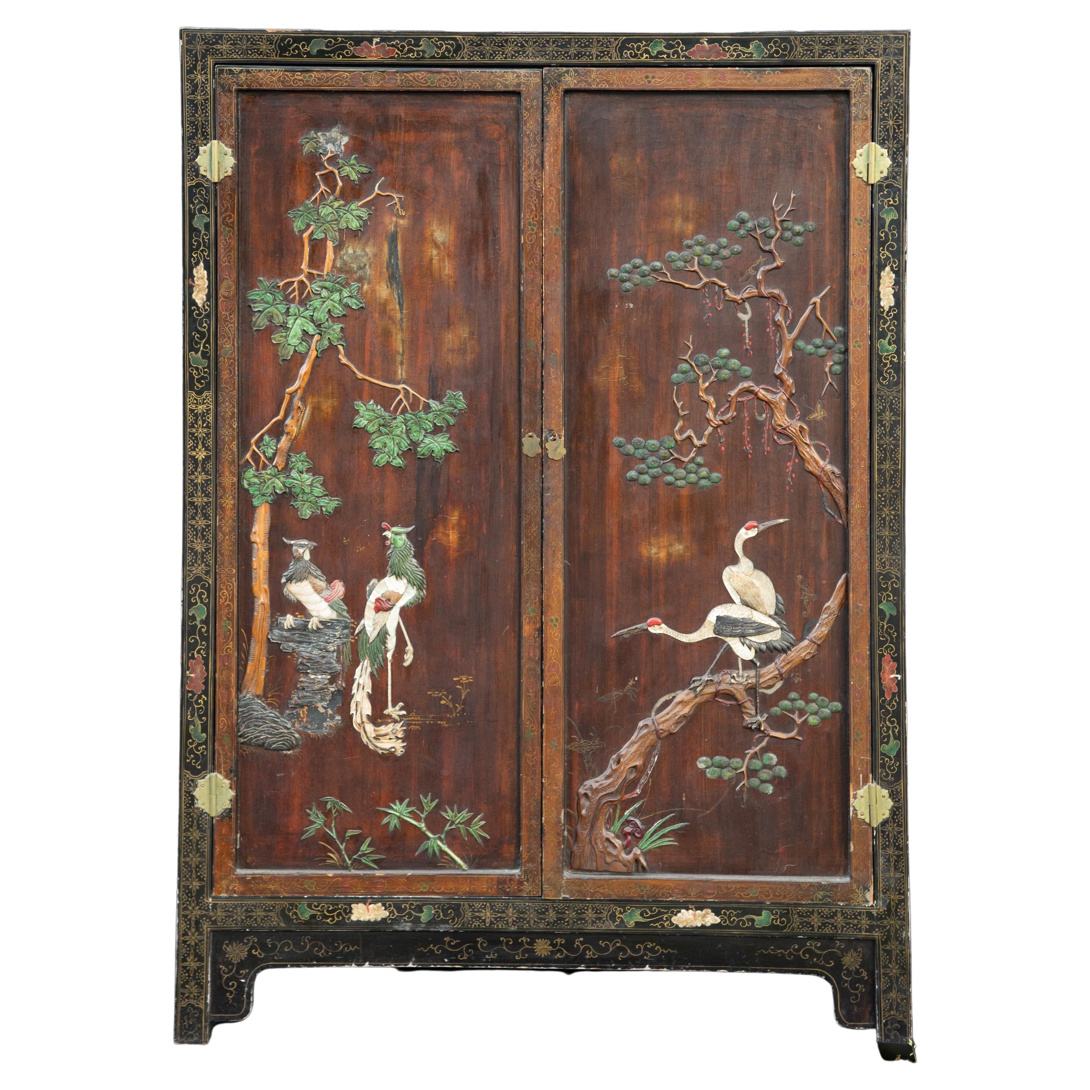 19th Century Chinese Armoire Decorated with High Relief Flora and Fauna 57.75"H