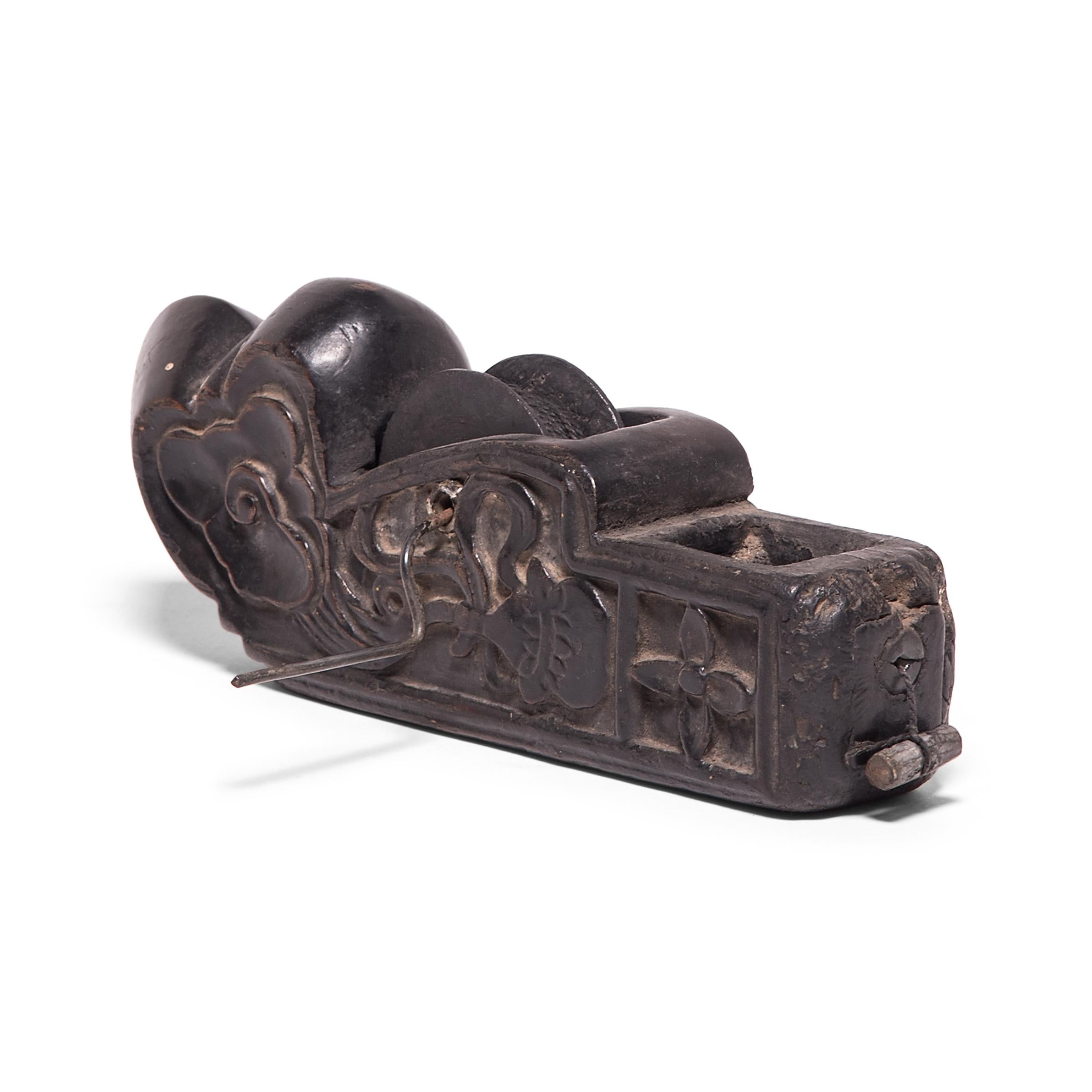 Given the beauty and thoughtful design of traditional Chinese furniture, it’s no wonder that Qing-dynasty carpenter’s tools were accorded the same attention to detail. This remarkably intact 19th century inkline reel was hand carved from northern