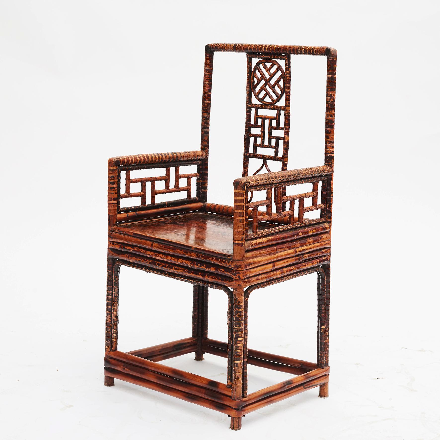 19th century Chinese bamboo armchair with a plain flat wooden seat.
China, circa 1840.
Good quality and craftsmanship.