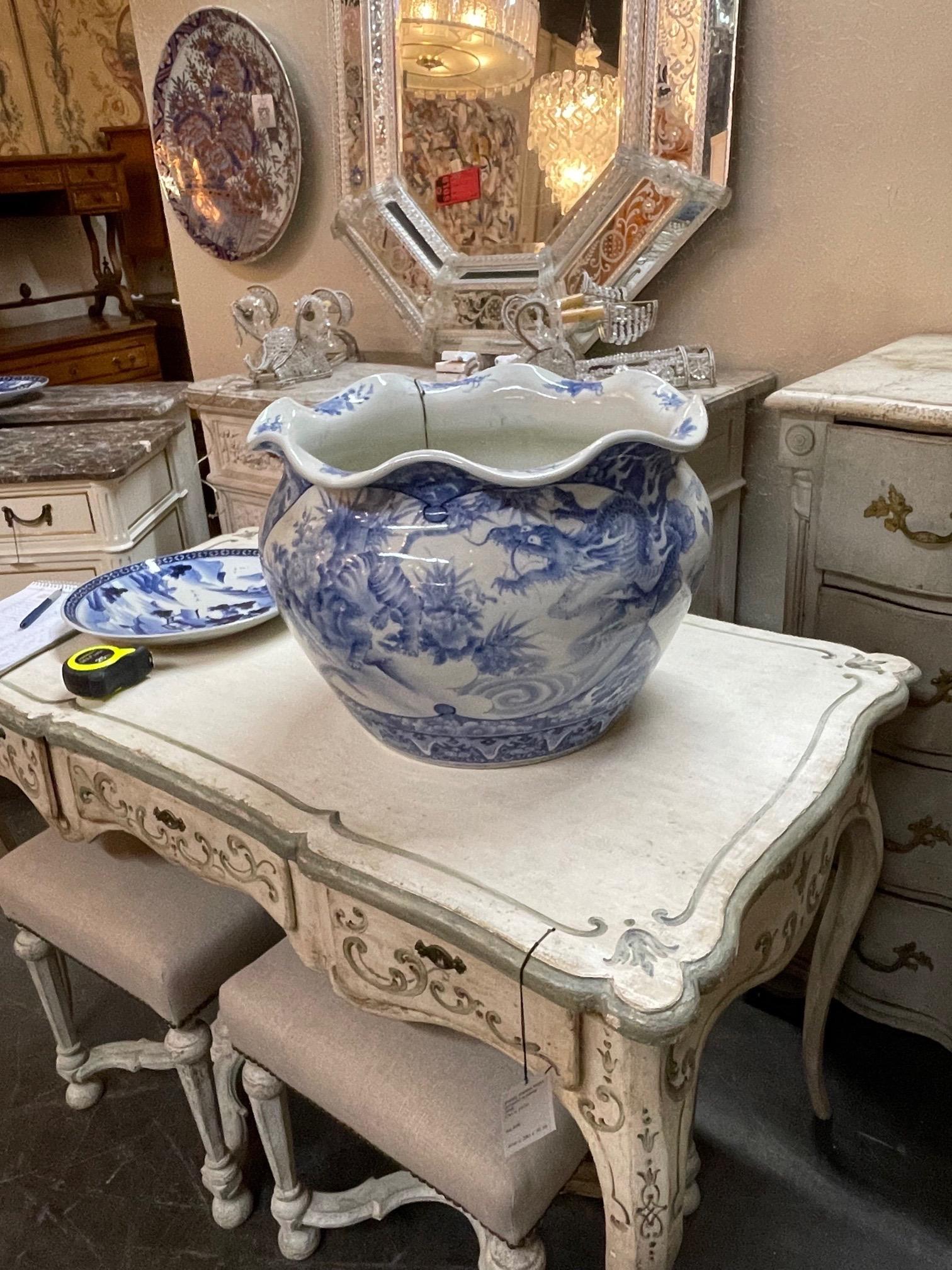 Beautiful large 19th century Chinese blue and white Jardinere with lovely Cantonese images. A very fine accessory that would make a lovely gift!