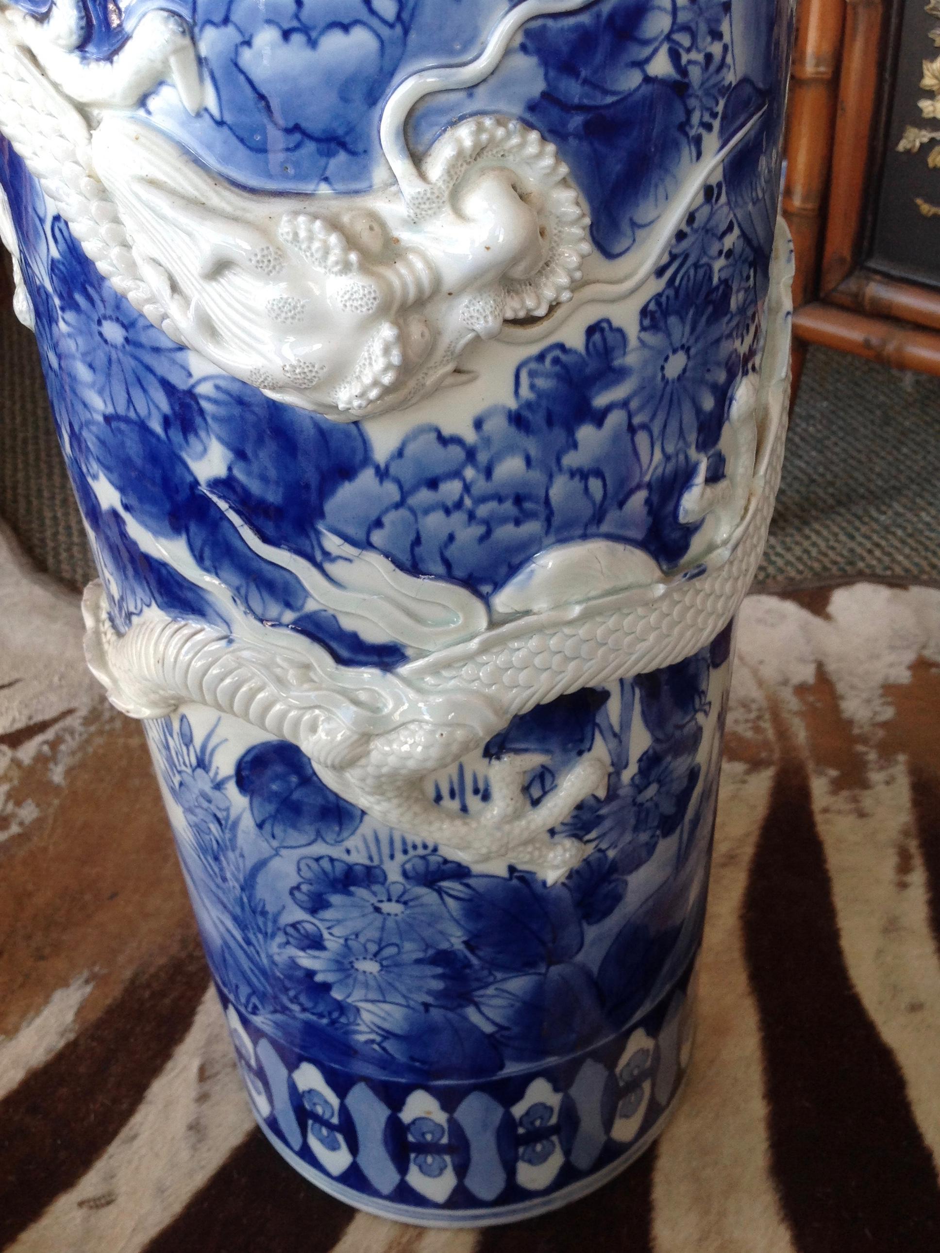 blue and white umbrella holder