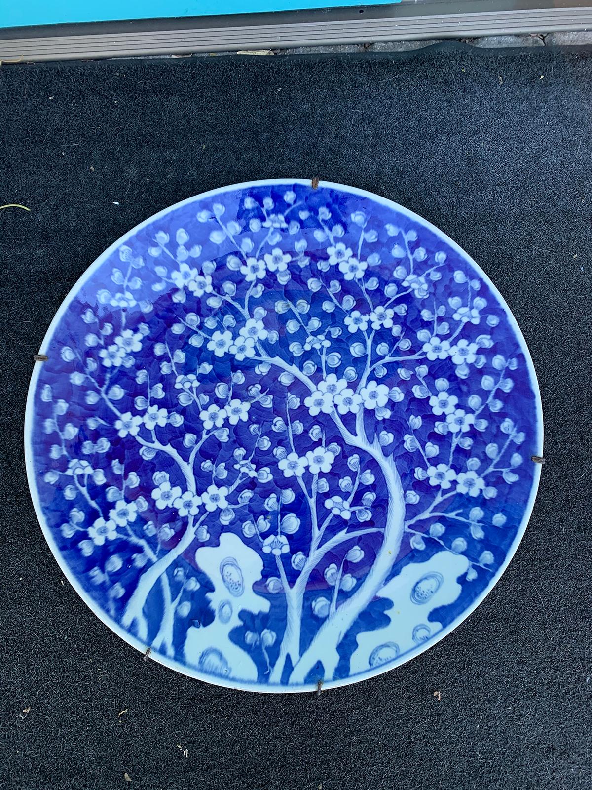 Large scale 19th century Chinese blue and white cherry blossom round porcelain charger.