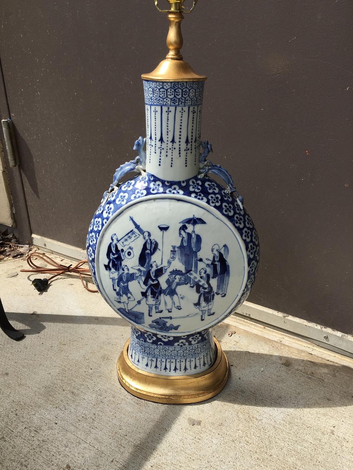 19th century circa 1890 Chinese blue and white porcelain moon flask as lamp on custom giltwood base
New wiring.