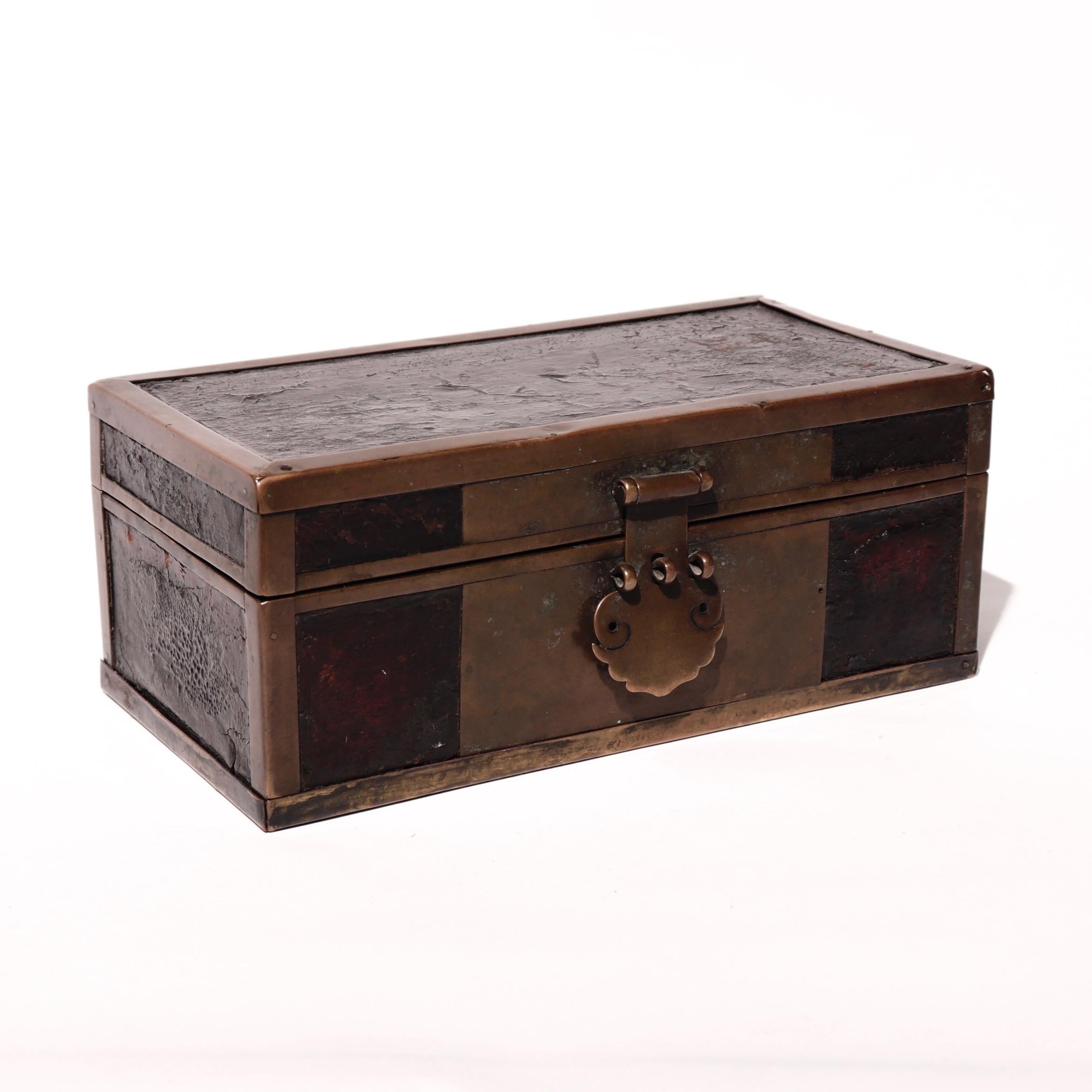 Chinese brass and lacquered wood document box, simple rectangular wood box with brass hardware edgings for protection and front lock plate, wood section covered in a dark lacquer, hinged top lid, front with large rectangular brass front plate with