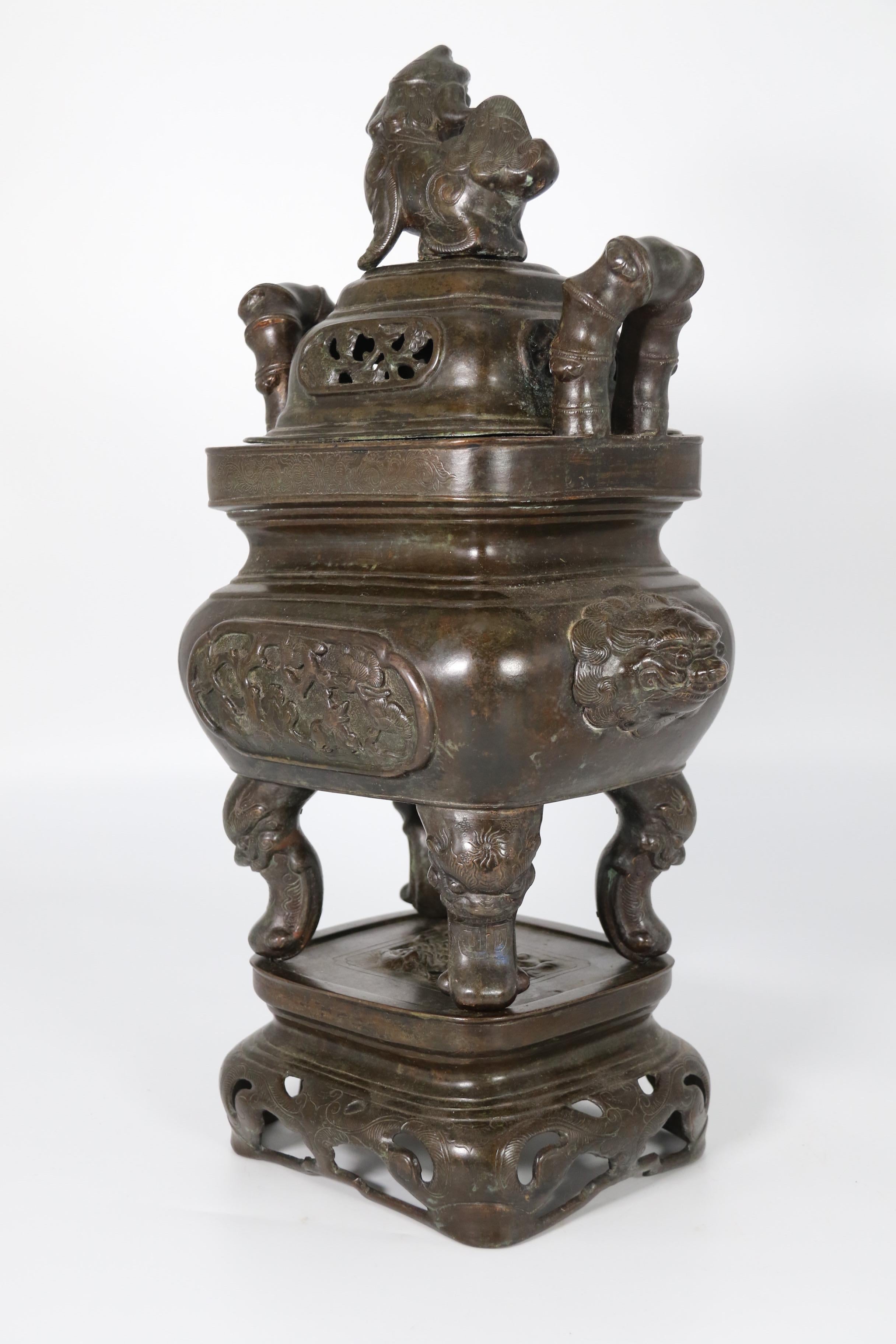 Cast 19th century Chinese bronze cencer with Buddhist lion decoration circa 1860 For Sale
