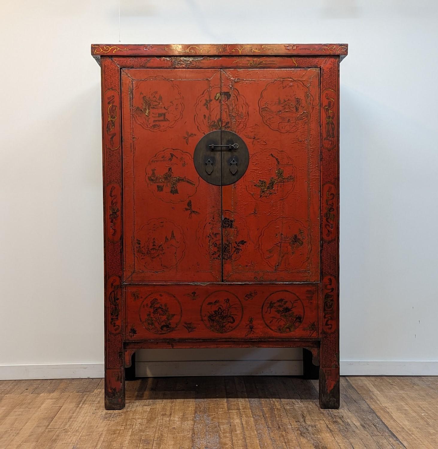 19th Century Chinese Red Lacquered Cabinet.  A beautiful 19th Century Red Lacquer Gilt Painted Qing Dynasty Cabinet.  Early 1800's a wonderful piece from Shanxi Province.  The warm worn cinnabar red lacquer has a spectacular patina of 180 plus