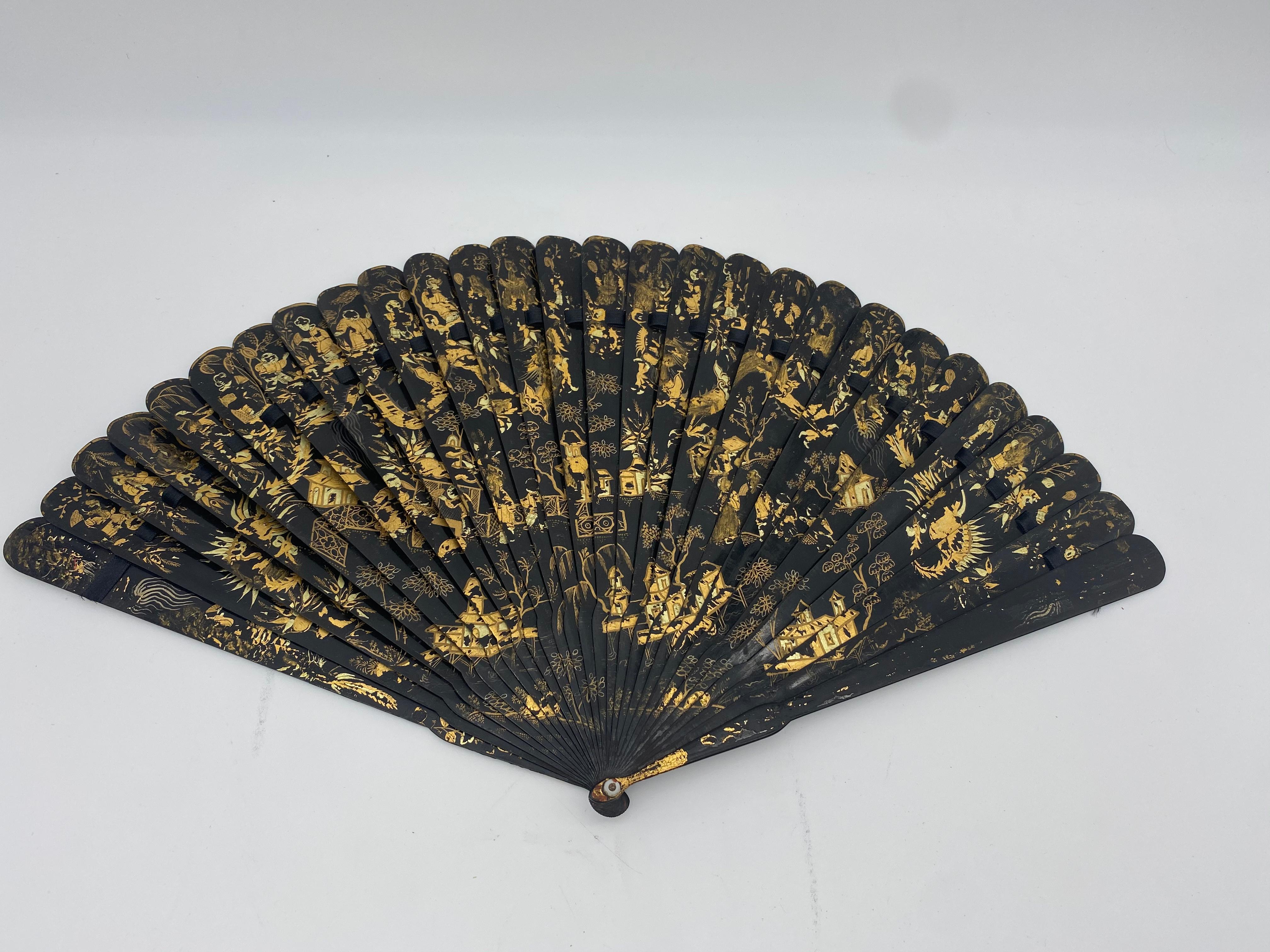 Antique 19th century Chinese canton export gilt lacquer brise fan from the Qing Dynasty.