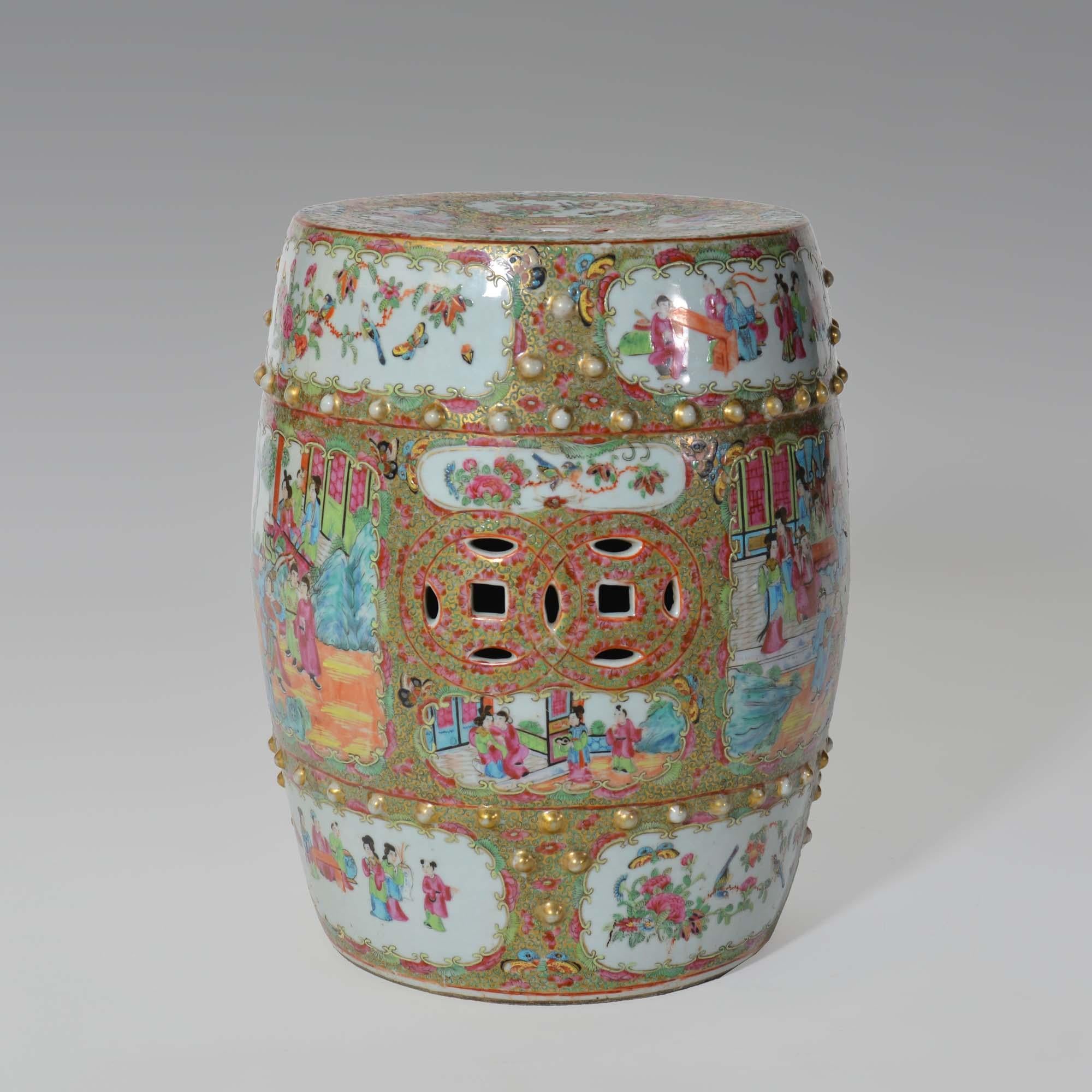 9th century Chinese Canton famille rose porcelain garden seat
Porcelain garden seat modelled as a drum with nail head bosses to top and bottom, the sides with two large panels depicting figures of the court watching actors in traditional dress armed
