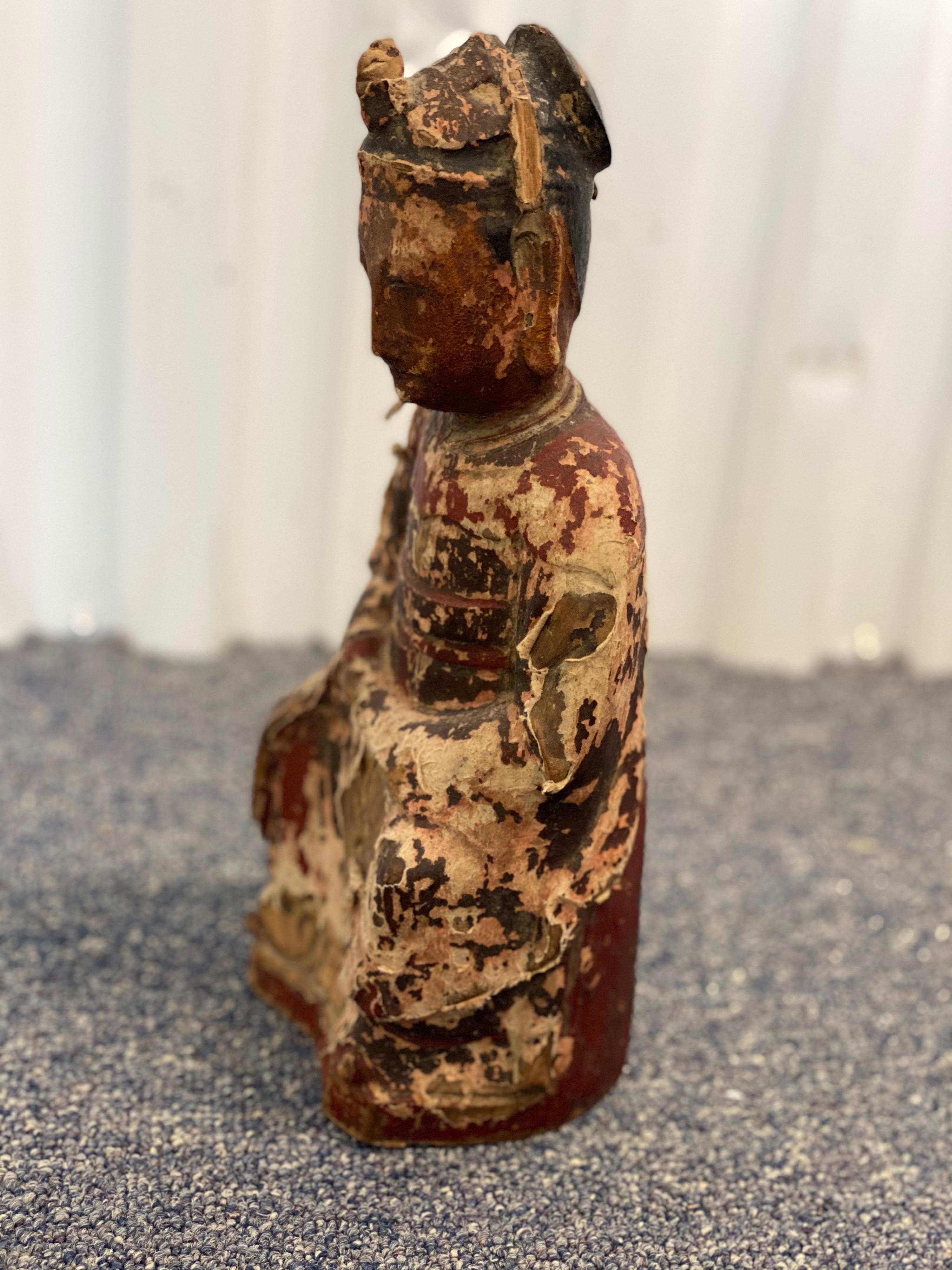 19th century Chinese carved Ancestor figure
This carved figure bears the likeness of one of its original owner's important forebears. A carved slot in the figures back was once a small compartment for written prayers. 

Condition:
No structural