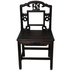 19th Century Chinese Carved Wooden Chair with Cherry Blossoms and Dark Lacquer