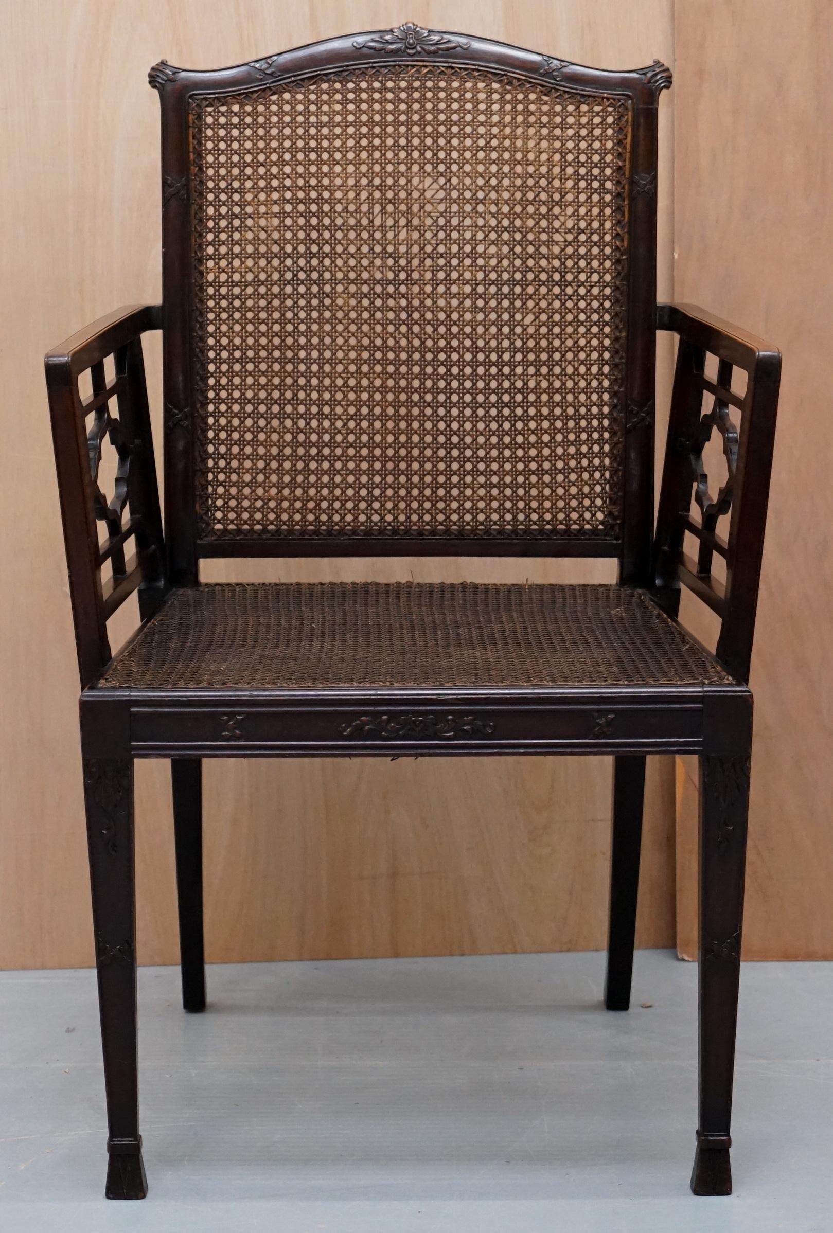 English 19th Century Chinese Chippendale Bergère Armchair Carved Fretwork Detailed Frame