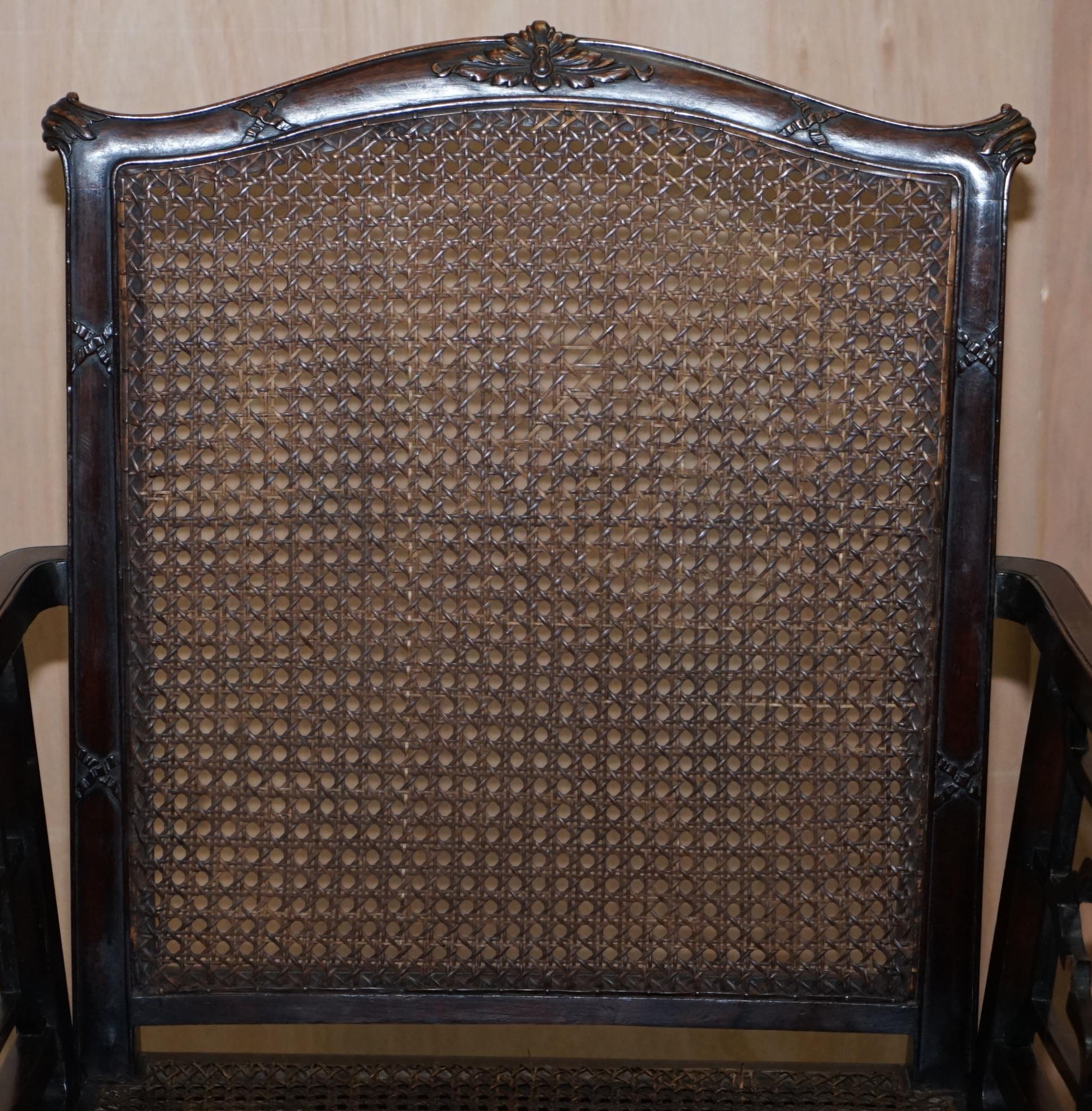 Hand-Crafted 19th Century Chinese Chippendale Bergère Armchair Carved Fretwork Detailed Frame