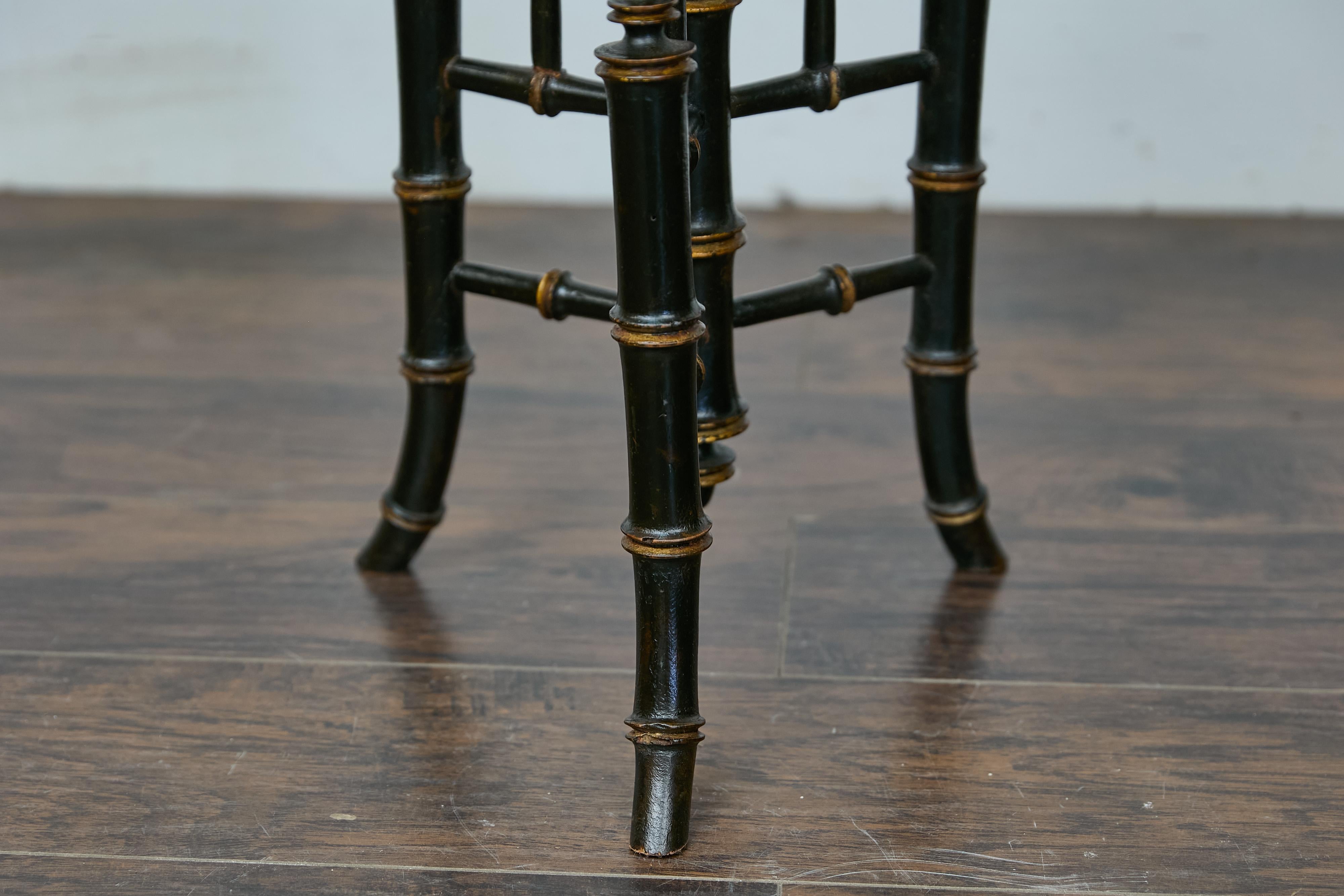 Ebonized 19th-Century Chinese Chippendale Table with Faux Bamboo Base and Zebra Top