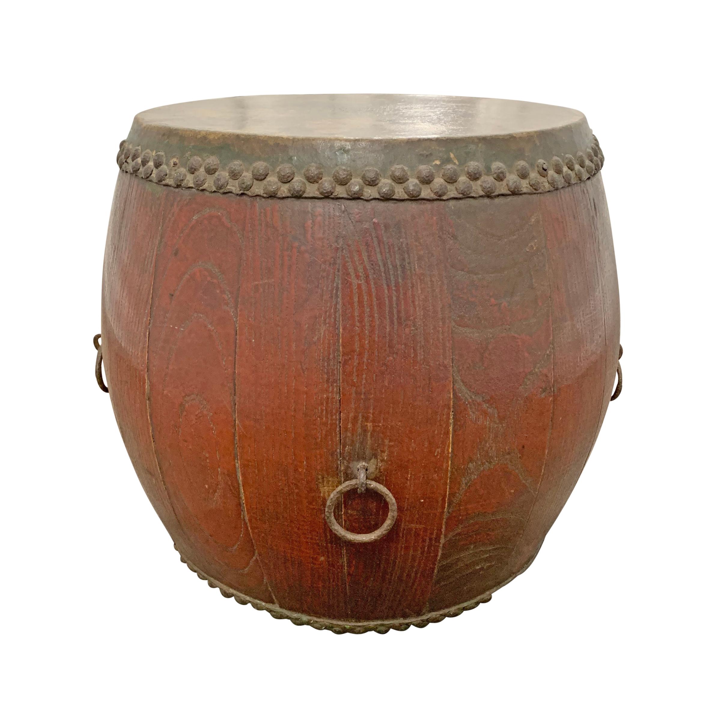 A wonderful 19th century Chinese opera drum that's perfect for use as a side table or drinks table. Each end has stretched hide drumheads and nail head trim.