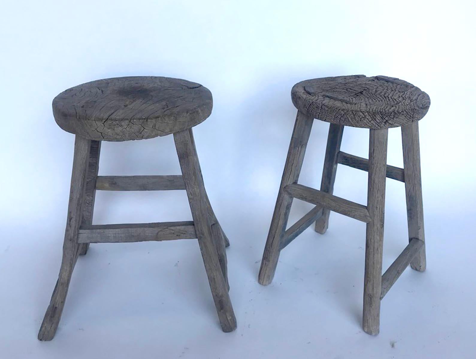 19th c. Chinese elm stools with various base configurations. Smooth, weathered, worn grey patina. Mortise and tenon joinery. Great for extra seating, a small side table or as a plant stand.
Sold separately, $785 each. Please refer to left or right
