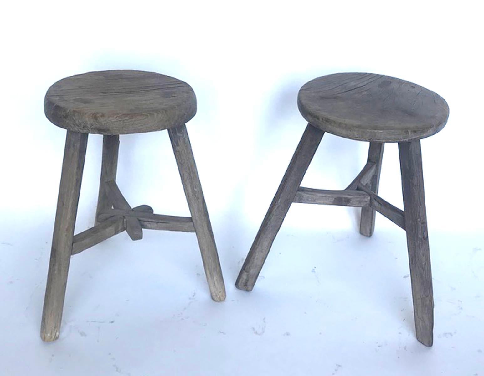 19th c. Chinese elm stools with various base configurations. Smooth, weathered, worn grey patina. Mortise and tenon joinery. Great for extra seating, a small side table or as a plant stand.
Sold separately, $785 each. Please refer to left or right