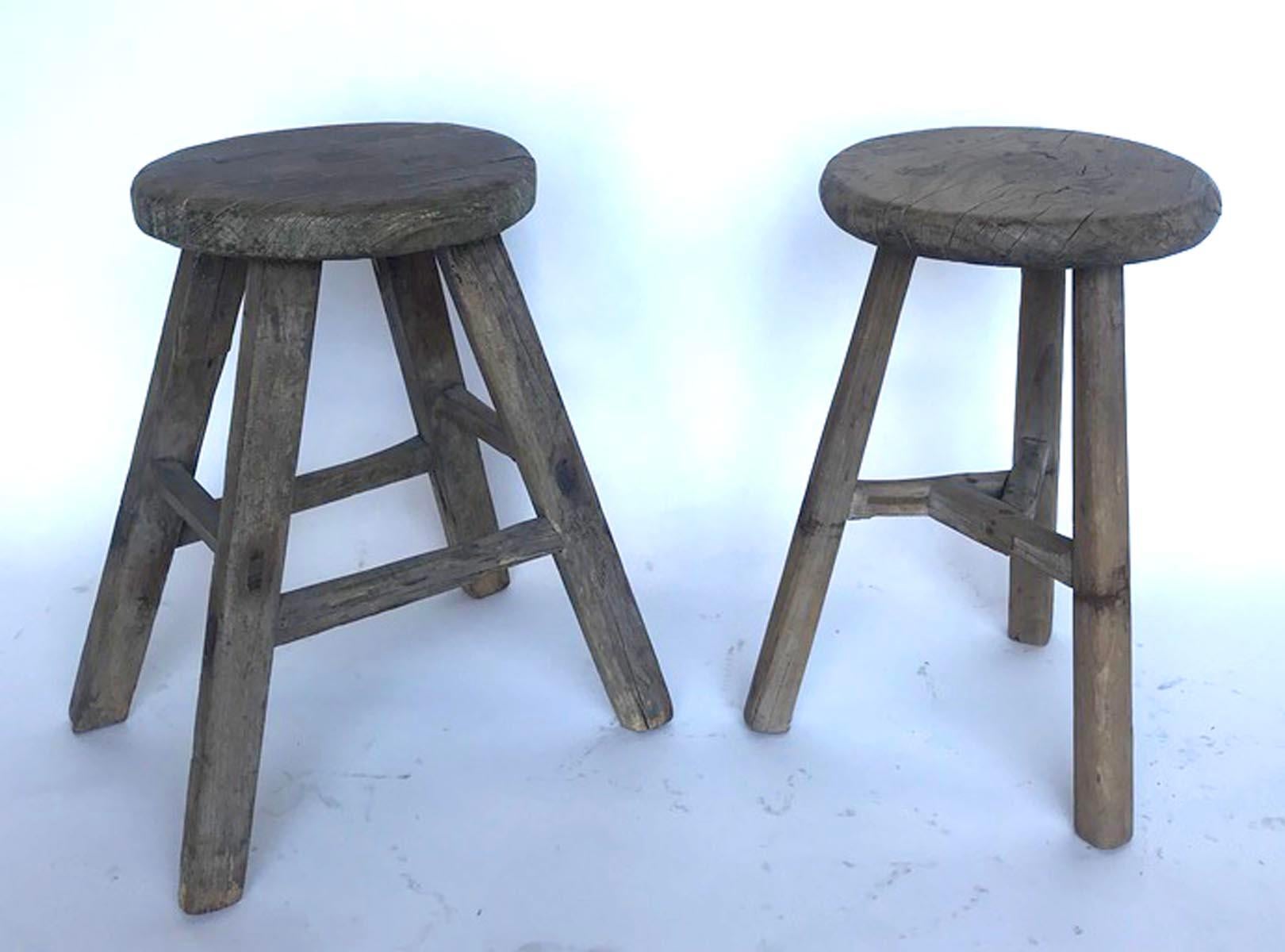 19th C. Chinese elm stool ( only the stool on the left is available) with various base configurations. Smooth, weathered, worn grey patina. Mortise and tenon joinery. Great for extra seating, a small side table or as a plant stand.
Sold separately,