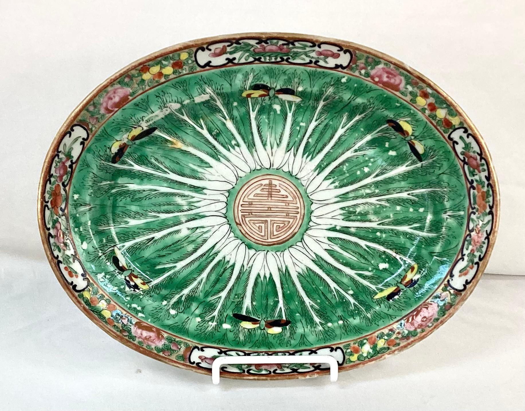 19th century Chinese cabbage leaf and dragonfly oval platter. Rich colors of green, yellow, pink and white with gold trim.