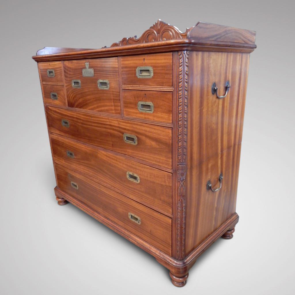 Mrs Clare's secretaire chest.
A fine 19th century Chinese export campaign chest with a fitted secretaire drawer original brass handles and lovely carved details to the corners and top.
Great colour and grain in the timber.

 