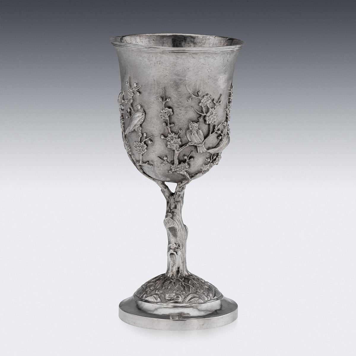 Antique mid 19th Century Chinese export solid silver wine goblet, impressive and exceptionally fine quality, double walled, applied with prunus flowers and exotic birds perching on branches, standing on domed foot and realistically modelled tree