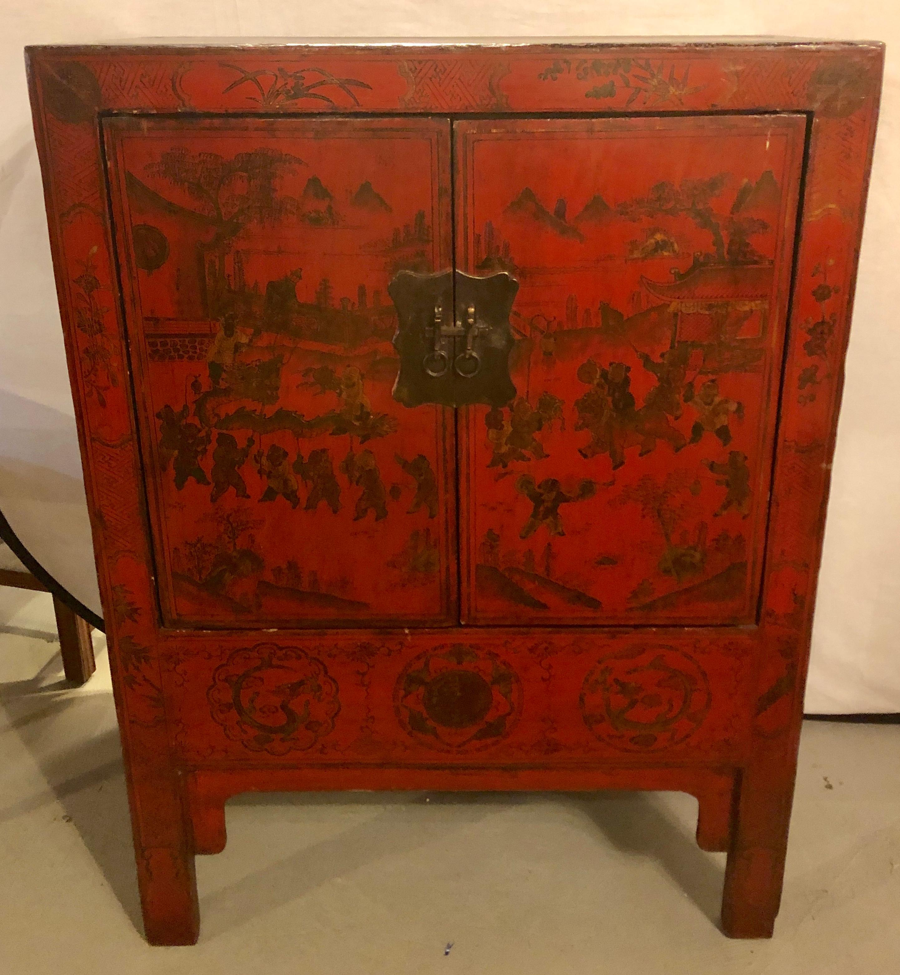 19th century Chinese export two-door commode or cabinet. A single drawer under a pair of doors leading to a large storage area. The exterior with finely painted figures and scenes.