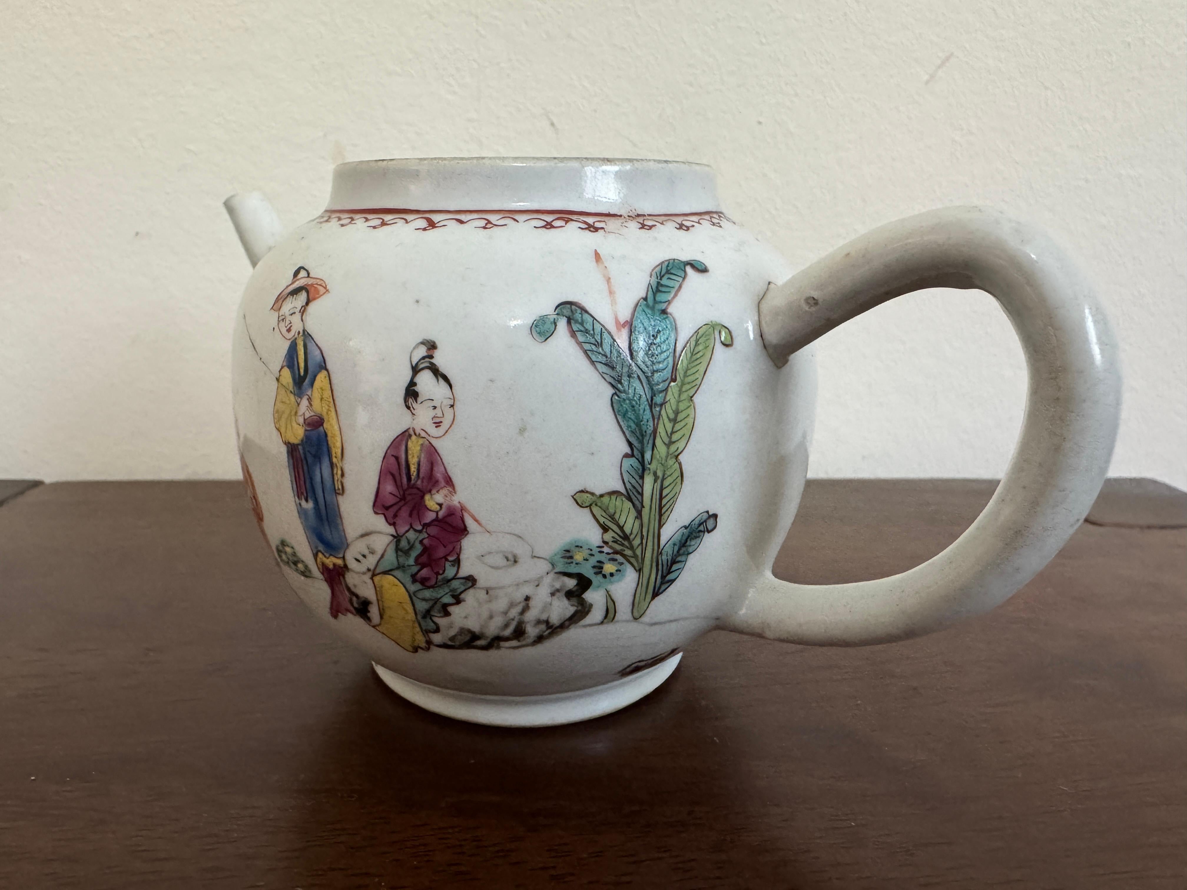 19th Century Chinese Famille Rose Teapot, white rounded body with colourful hand-painted designs, including figures in traditional clothing, foliage, and floral elements, a curved spout, and a handle, but missing the lid.



