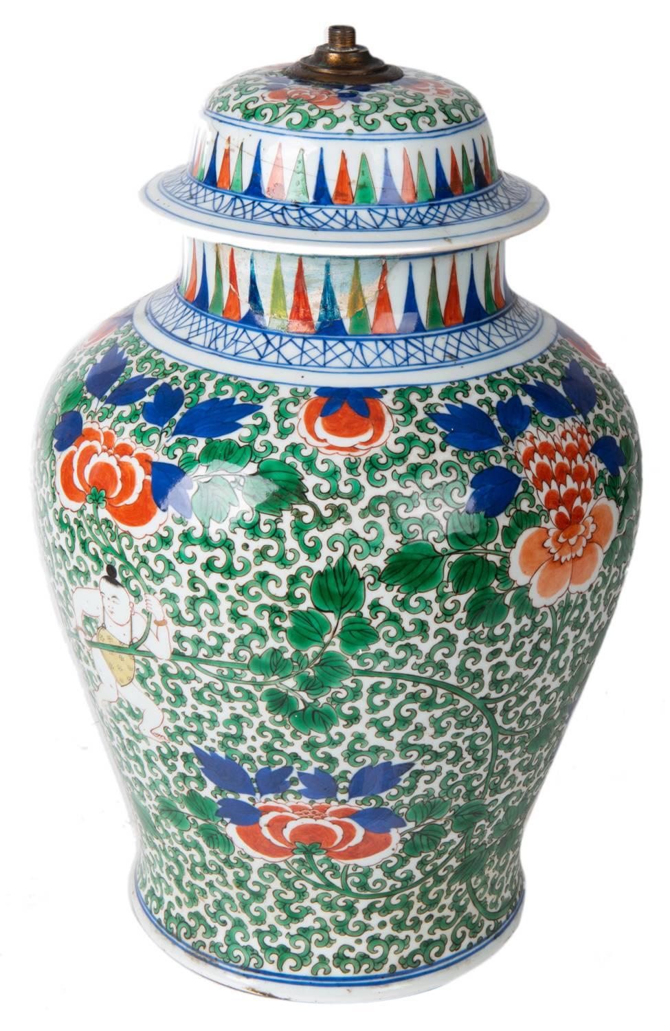 A good quality 19th century Chinese Famille verte lidded vase or lamp. Having wonderful green, blue and orange colouring, classical flower and motif decoration.