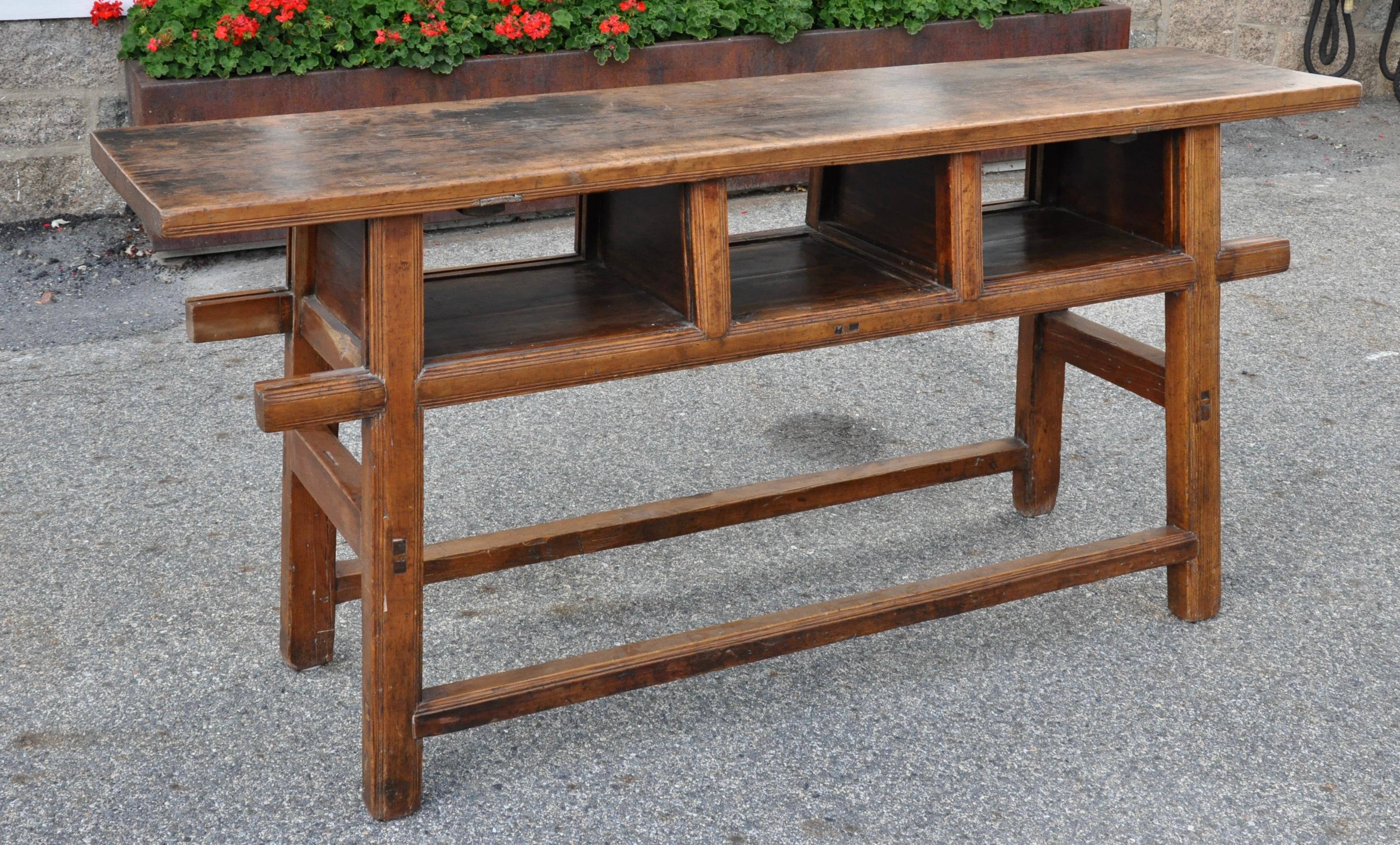 19th century Chinese farm or altar table, double sided with sliding lacquer panels and central lacquer drawer. Wonderful size to use as a server. Called a Dongbei in Northern China.

We are also showing this tenoned piece without its sliders and