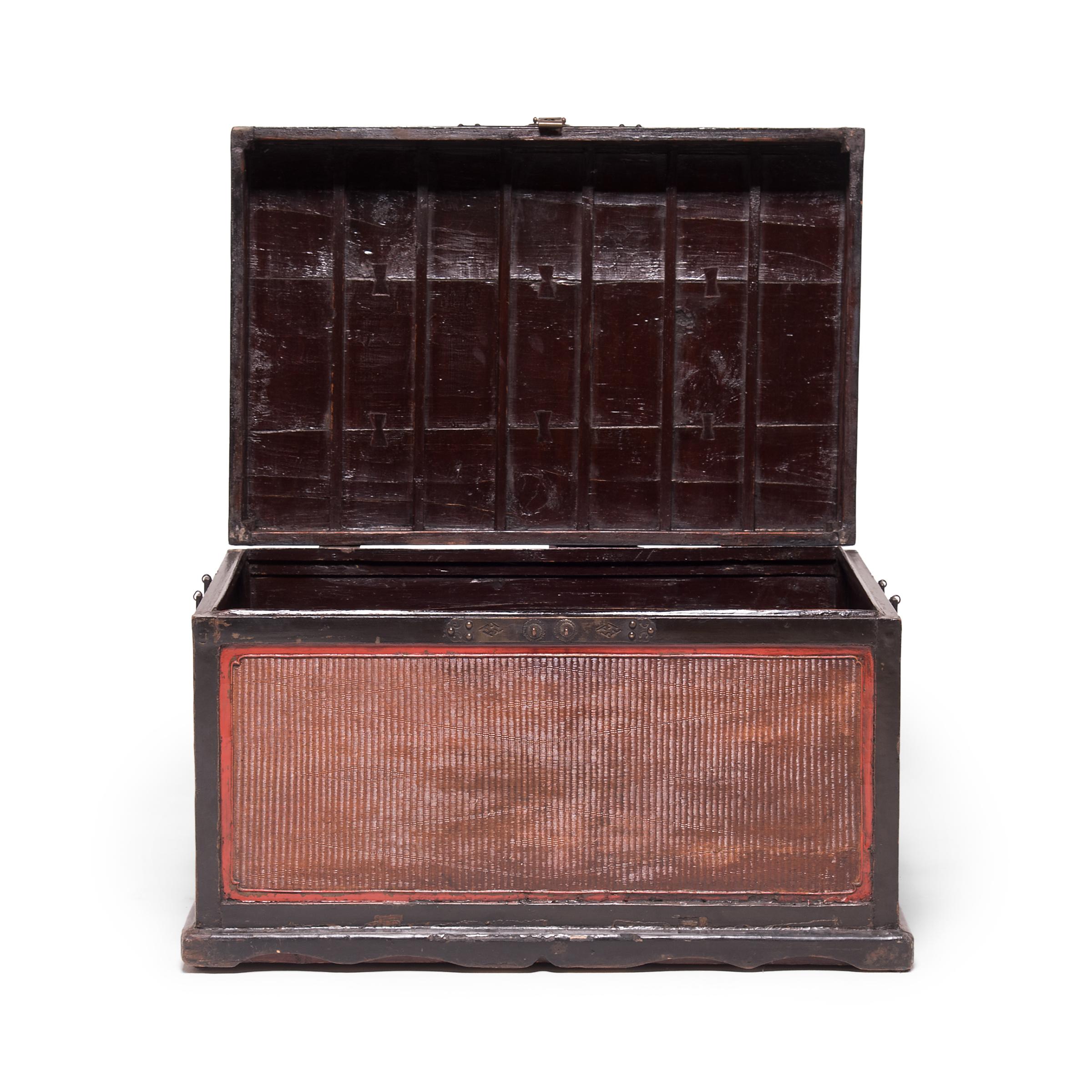 Chinese courtyard homes were traditionally designed without closets, so trunks such as this were frequently used for safekeeping and storage. This very fine early 19th century example, lined in cedar, was likely used in a aristocratic home for