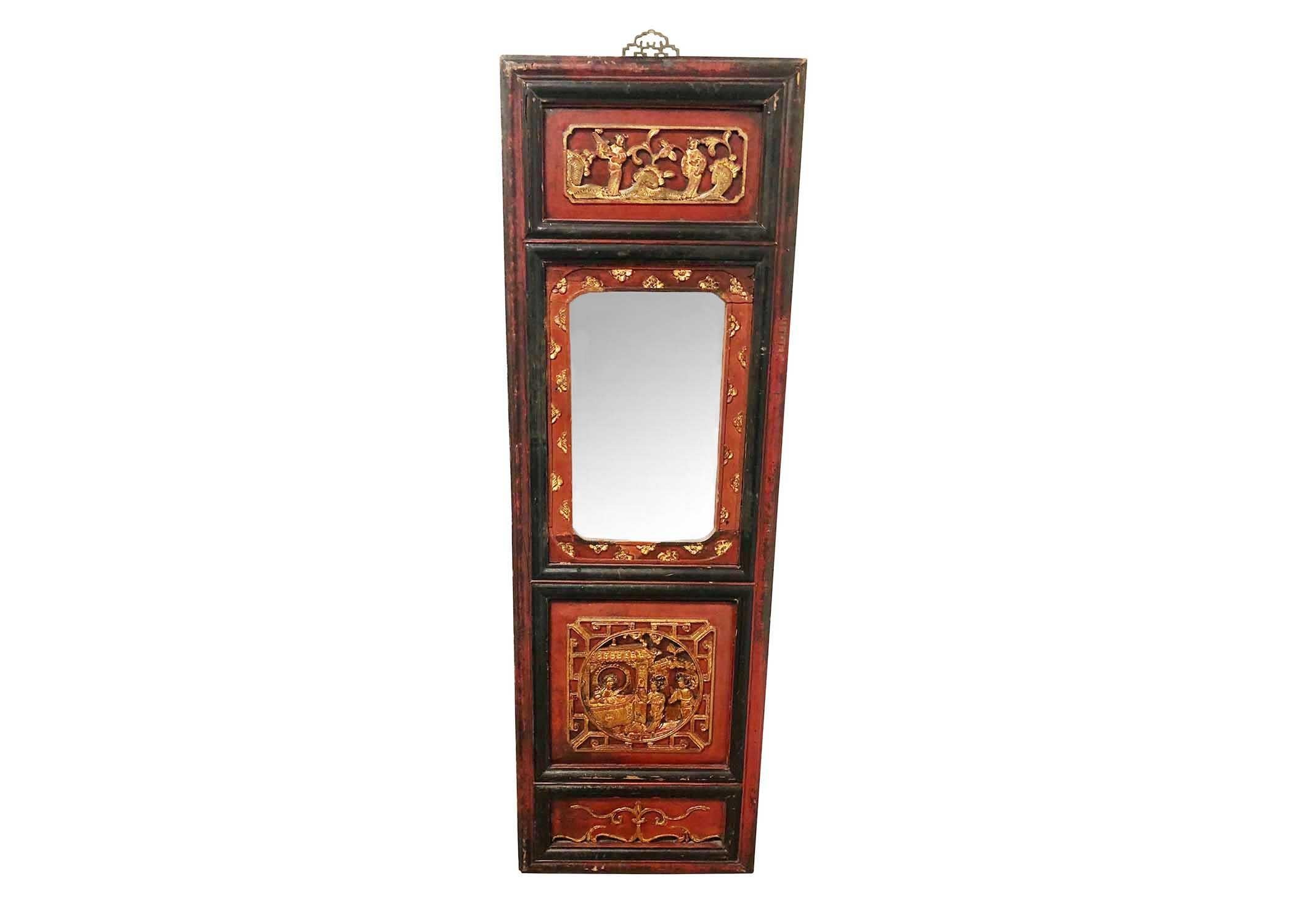 An early 19th century red lacquer with gold accents Chinese fragment with gold courting scenes converted into a mirror. Brass holder for hanging.