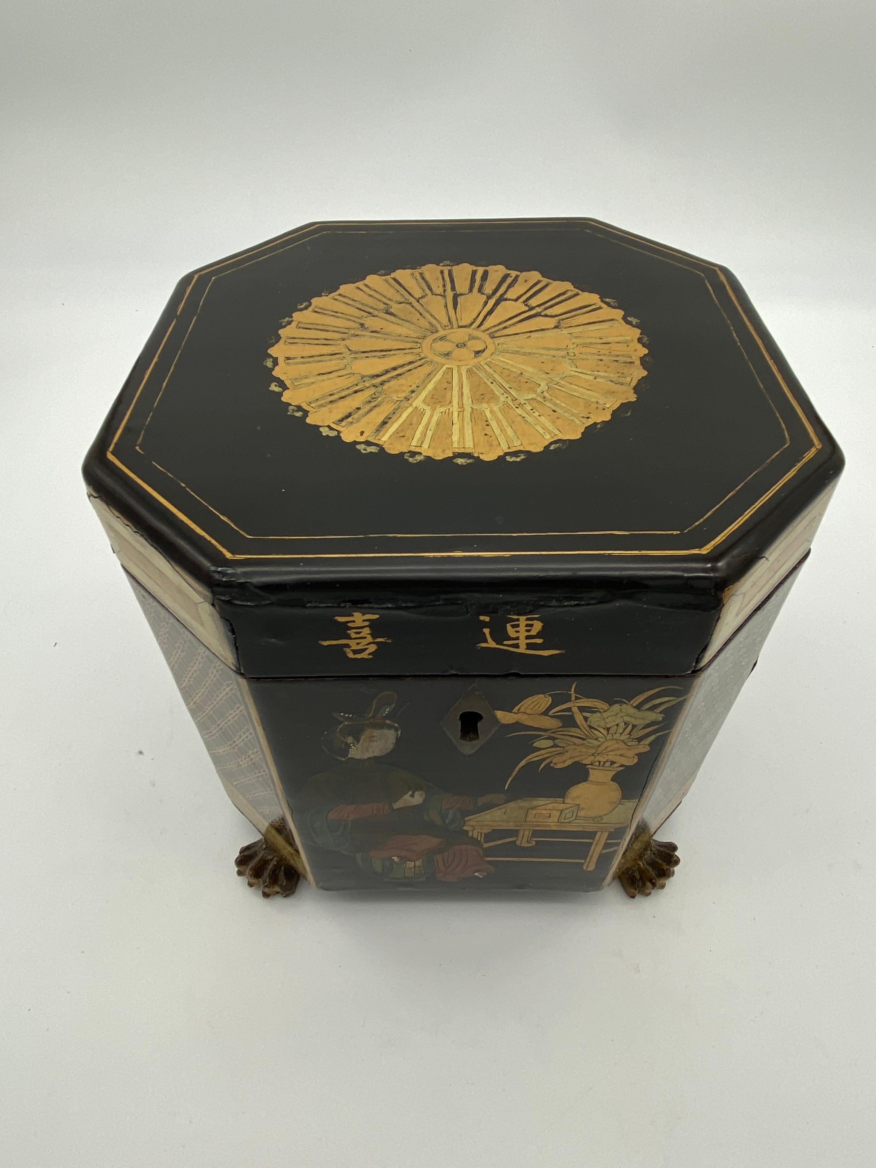 19th century Chinese gilt lacquer footed tea caddy with original pewter container from the Qing Dynasty.