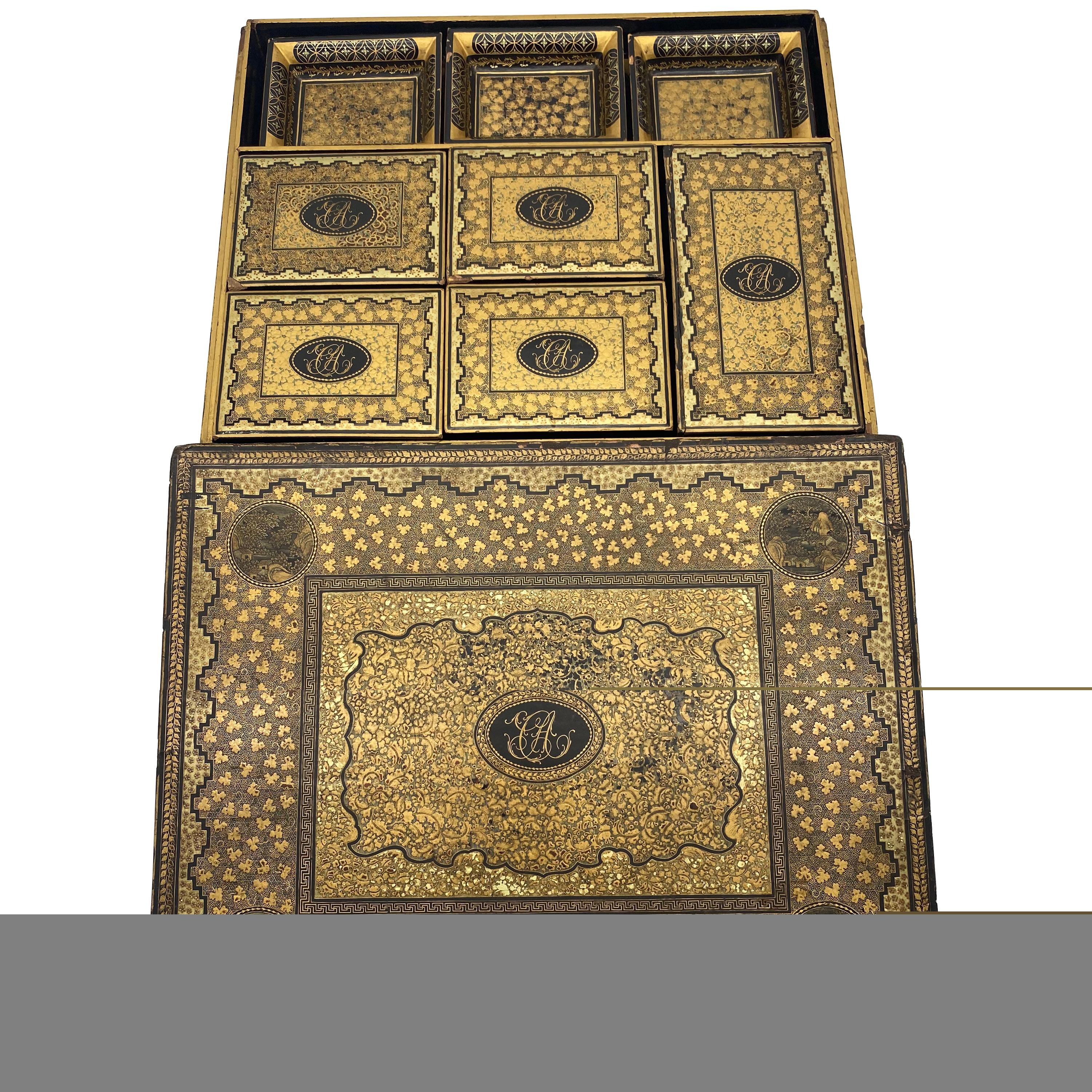 Very rare complete circa 1820 Chinese gilt lacquer gambling storage box trays and dishes. A great and complete gold and black lacquered gaming set. Measures: Outer box 14.5 in x 12 in x 2.75 in. Largest interior box 7 in x 3.75 in. Largest tray