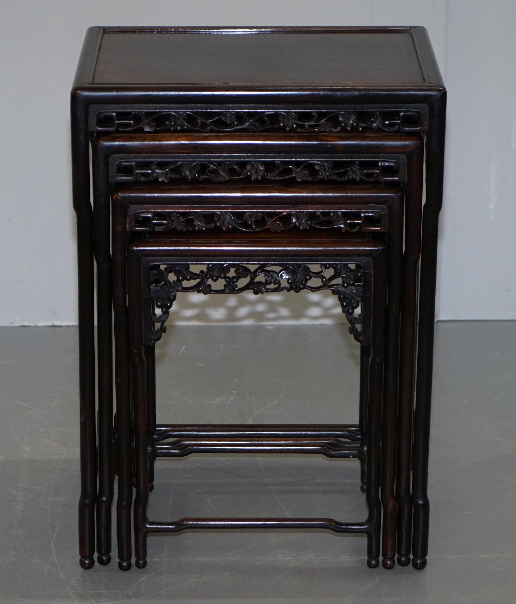 We are delighted to offer for sale this sublime 19th century hardwood nest of four heavily carved tables

A quintessentially Classic Chinese export piece, made for the British market during the late Victorian era when we were fascinated with the