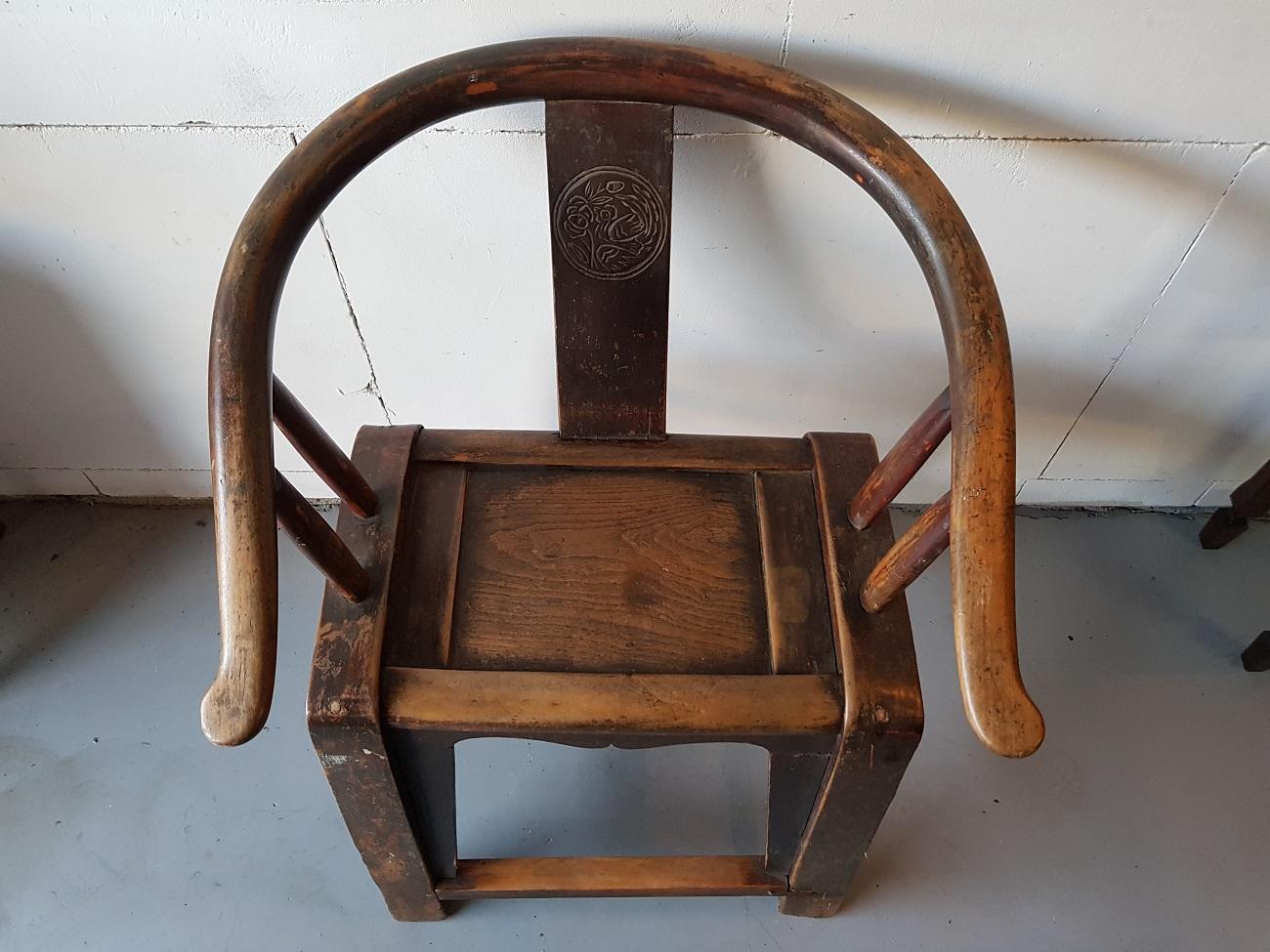 19th century Chinese horseshoe chair Quanyi from the Qing dynasty (several restorations).

The measurements are:
Depth 61 cm/ 24 inch.
Width 67 cm/ 26.3 inch.
Height 88 cm/ 34.6 inch.
Seat height 51 cm/ 20 inch.
 