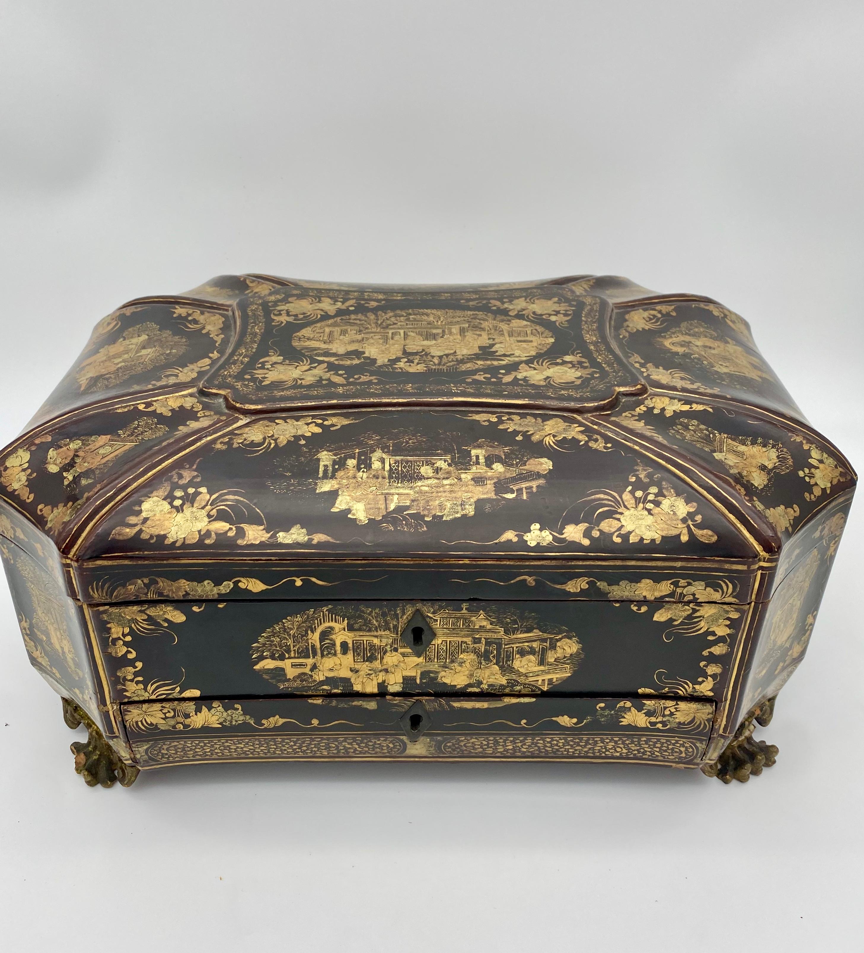 19th century Chinese lacquer sewing box from the Qing Dynasty. Decorated all over beautifully with intricate designs and images of ancient Chinese people and structures.